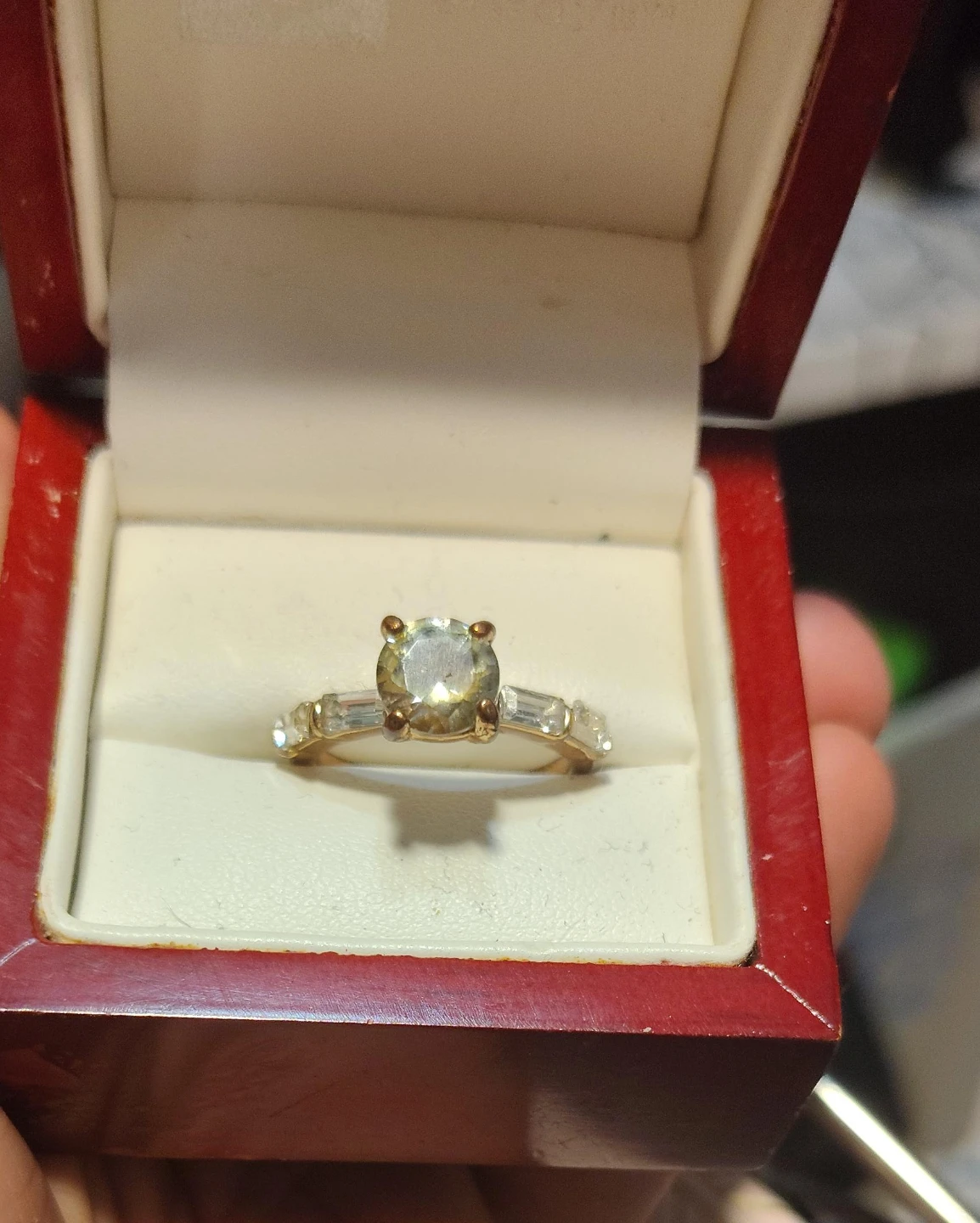 Gold Ring with Center Stone and Baguette Accents