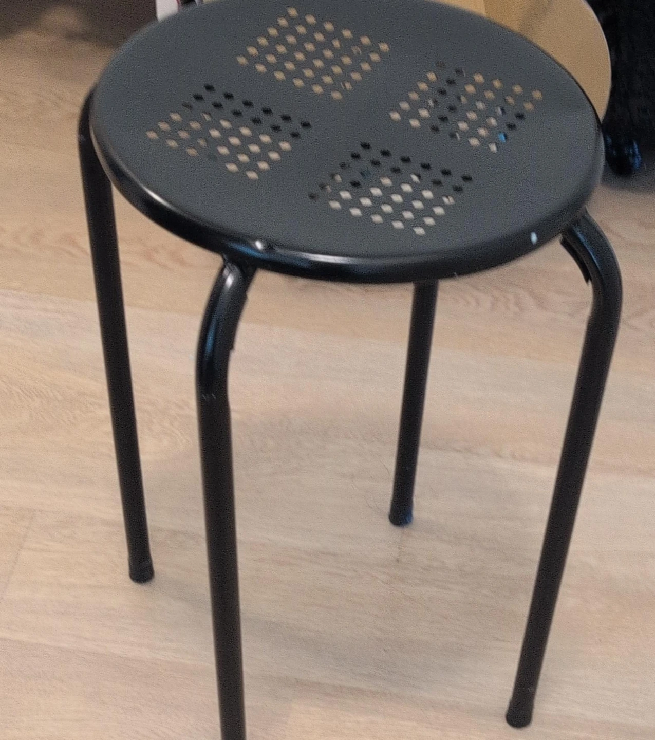 Black metal stool