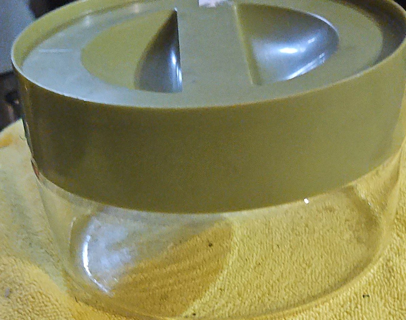 Glass and Green Plastic Container with Lid