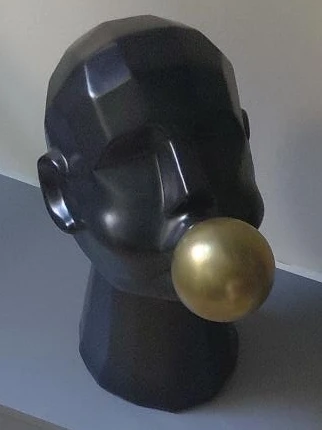 Black Head Sculpture with Gold Bubblegum