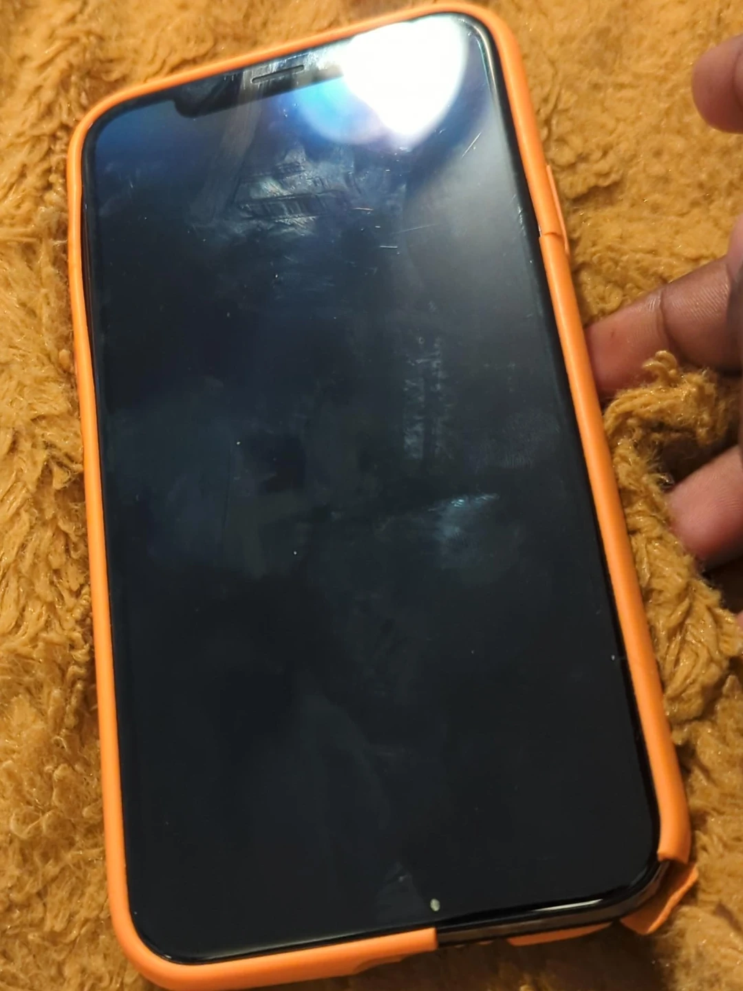 iPhone with Orange Case