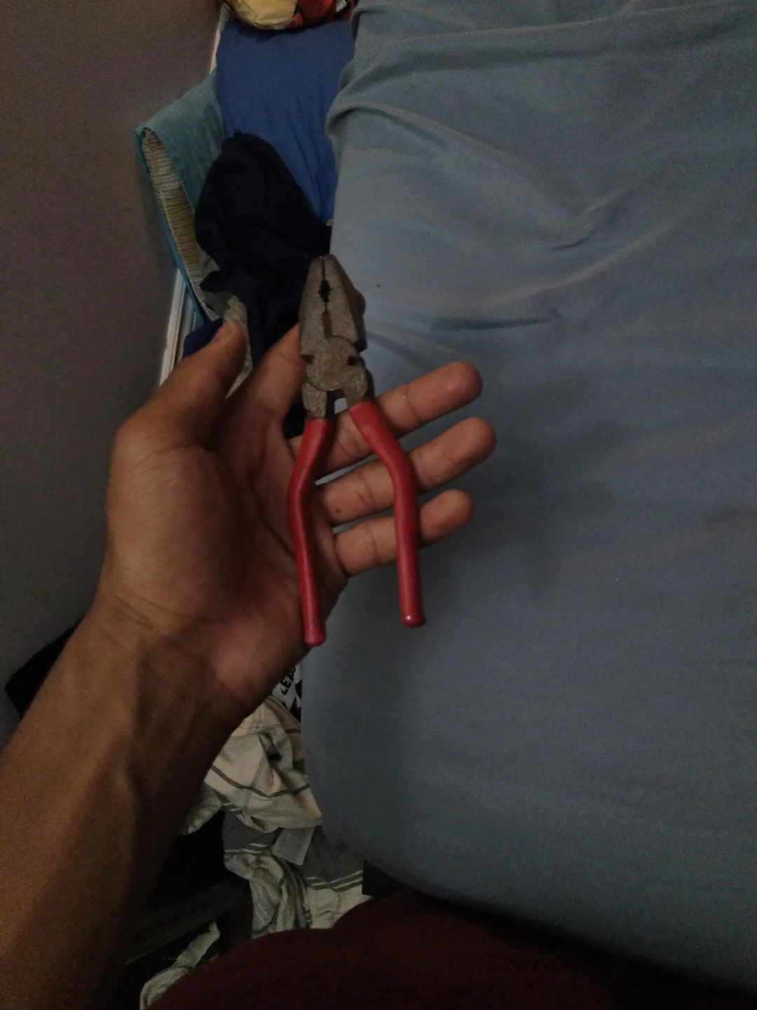 Pliers with red handles