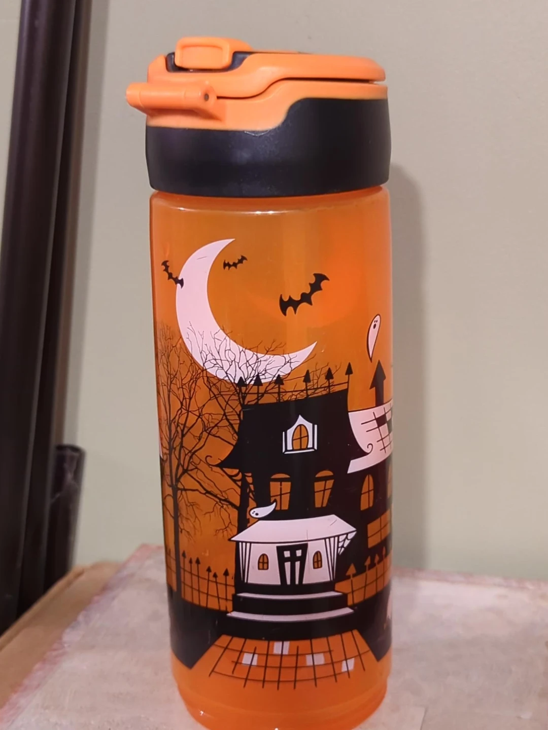 Orange Halloween Tumbler with Haunted House Design