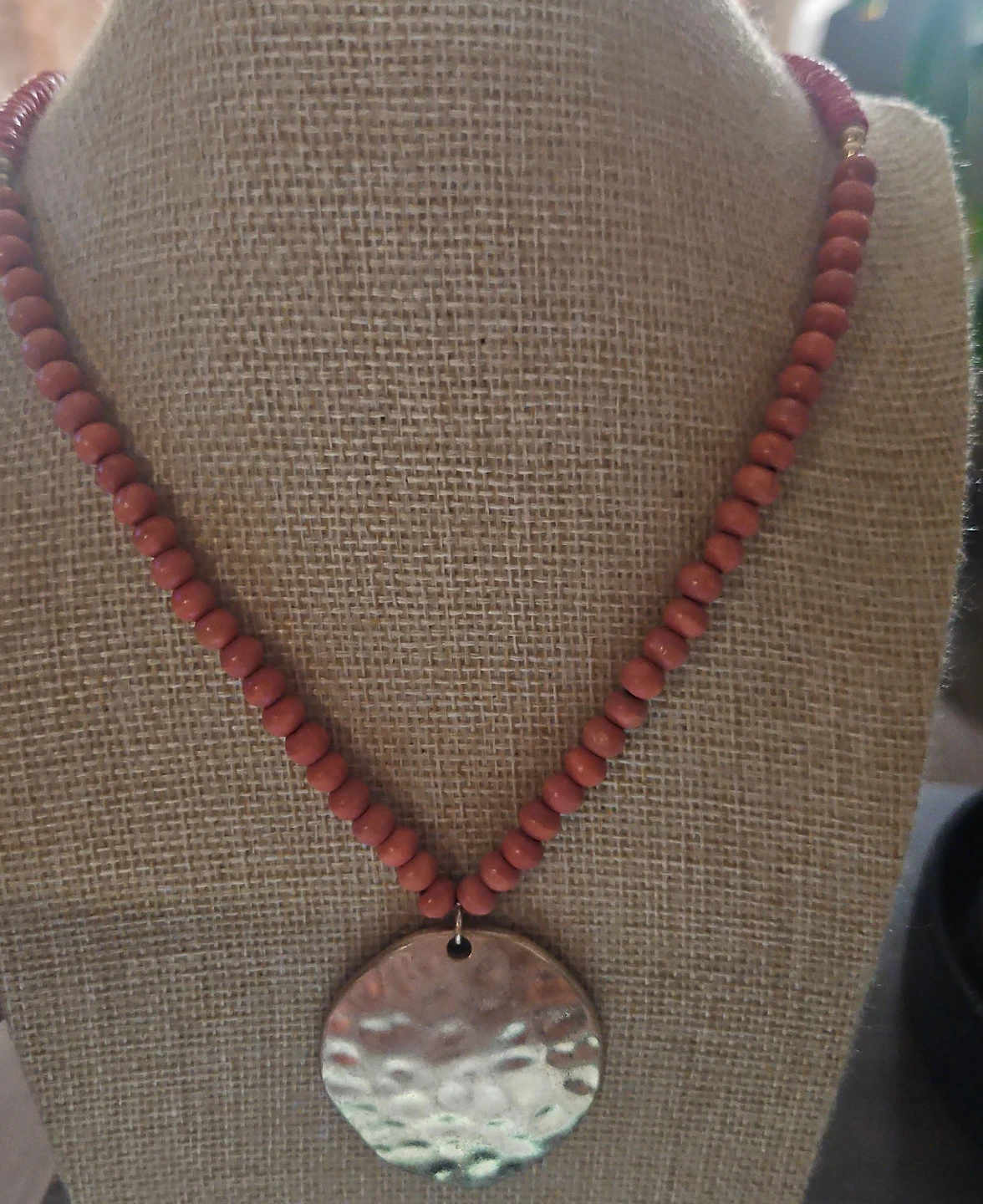 Red Beaded Necklace with Hammered Disc Pendant