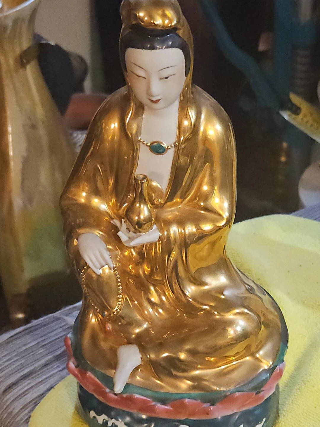 Gold Porcelain Figurine with Teal Necklace