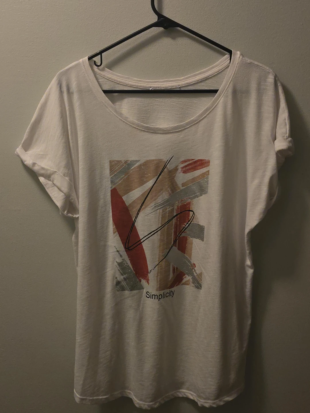 White T-Shirt with "Simplicity" Graphic