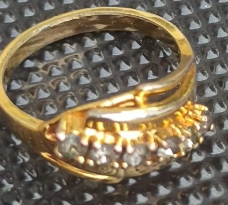Gold-tone ring with small stones