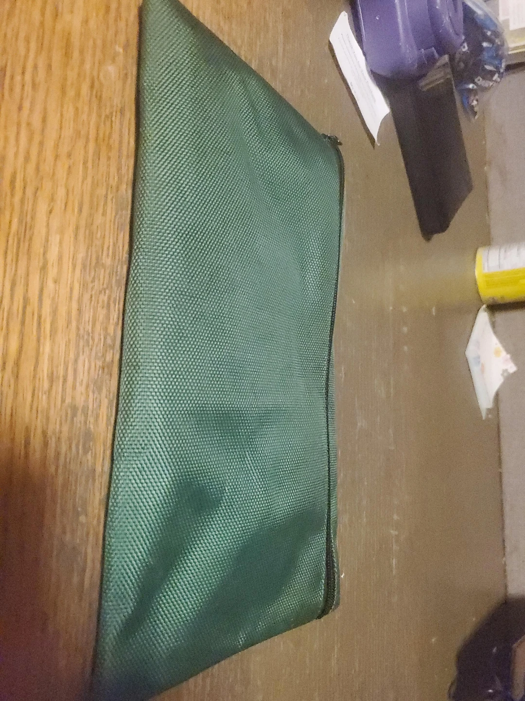 Green zippered pouch