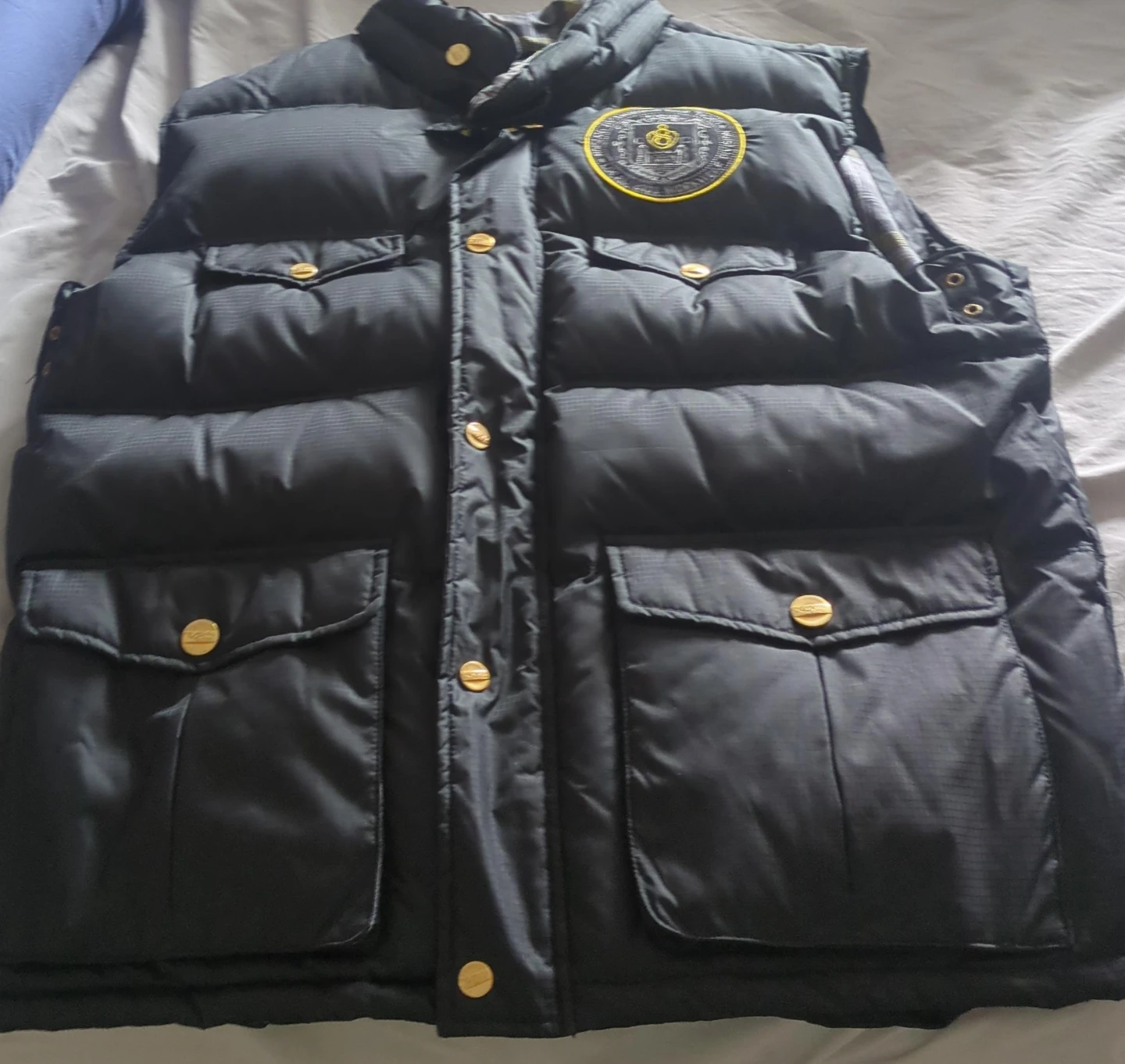 Black Puffer Vest with Gold Accents