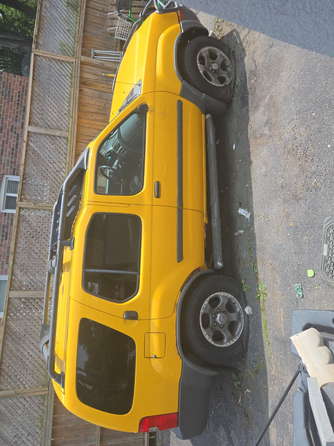 Yellow Nissan Xterra