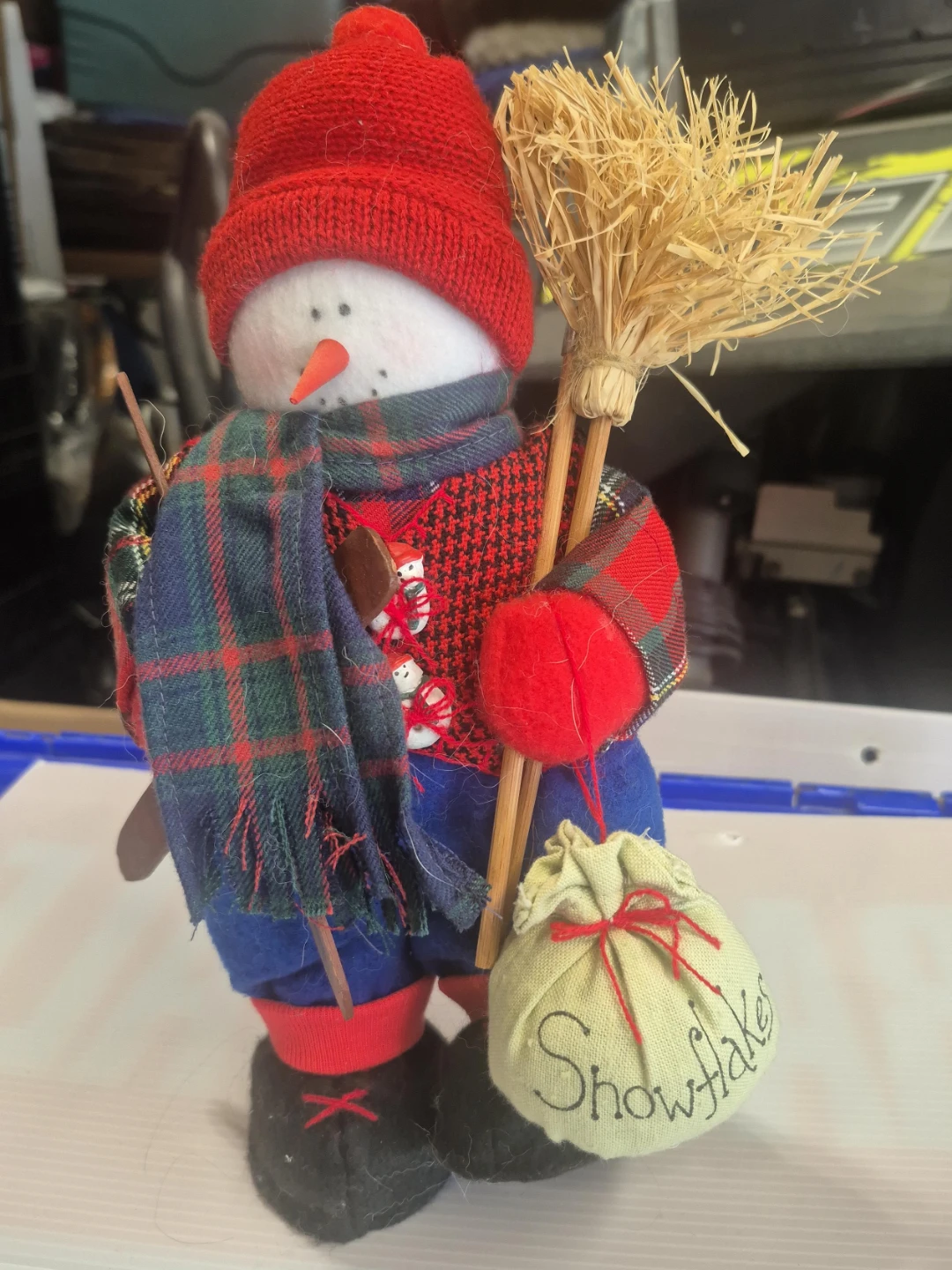 Decorative Snowman Figurine with Broom and Snowflake Bag