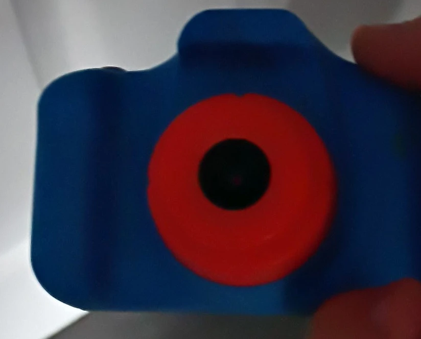 Blue Toy Camera with Red Lens