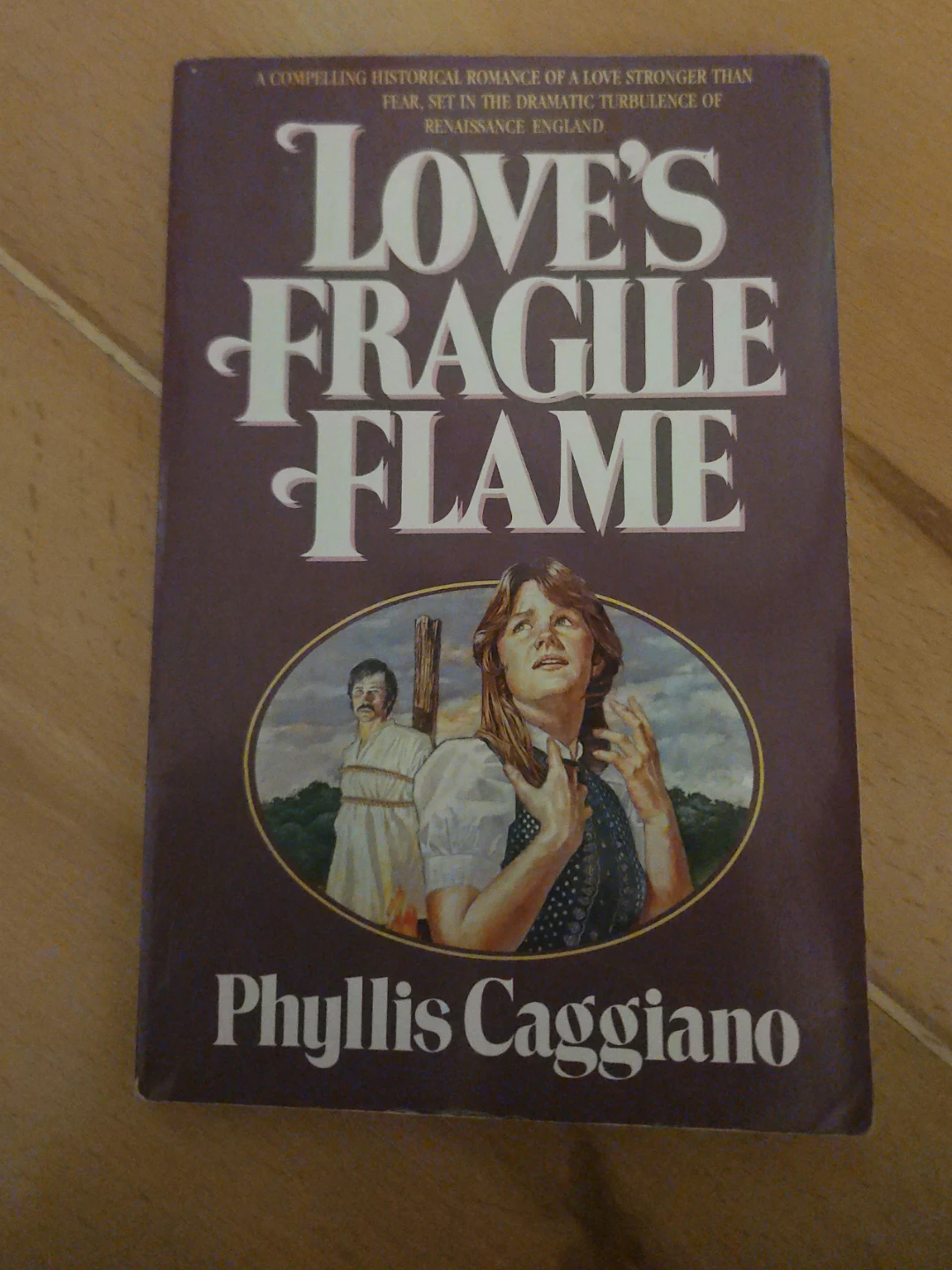 Love's Fragile Flame by Phyllis Caggiano
