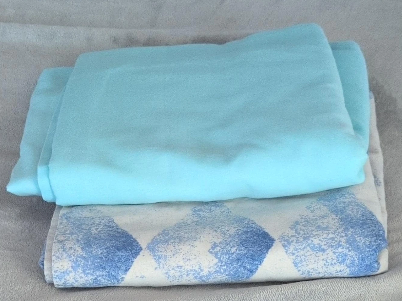 Two Blue bed sheets  $3 each
