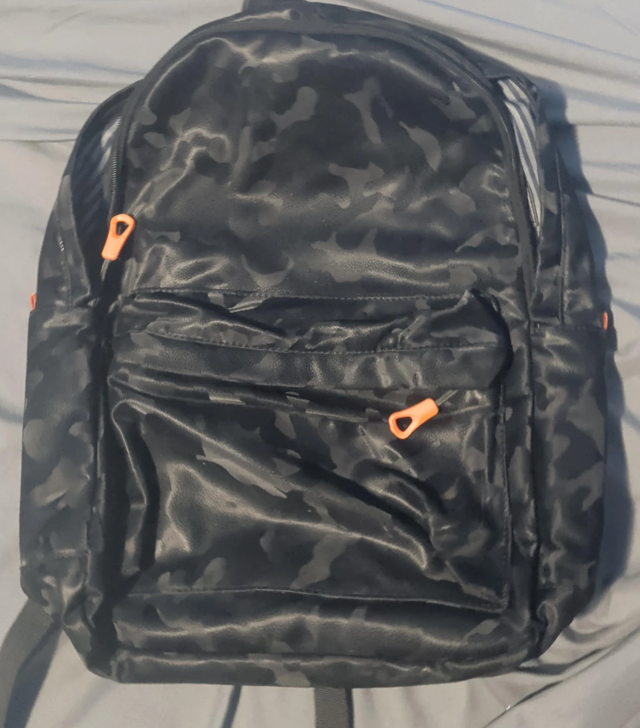 Camo Backpack with Orange Accents