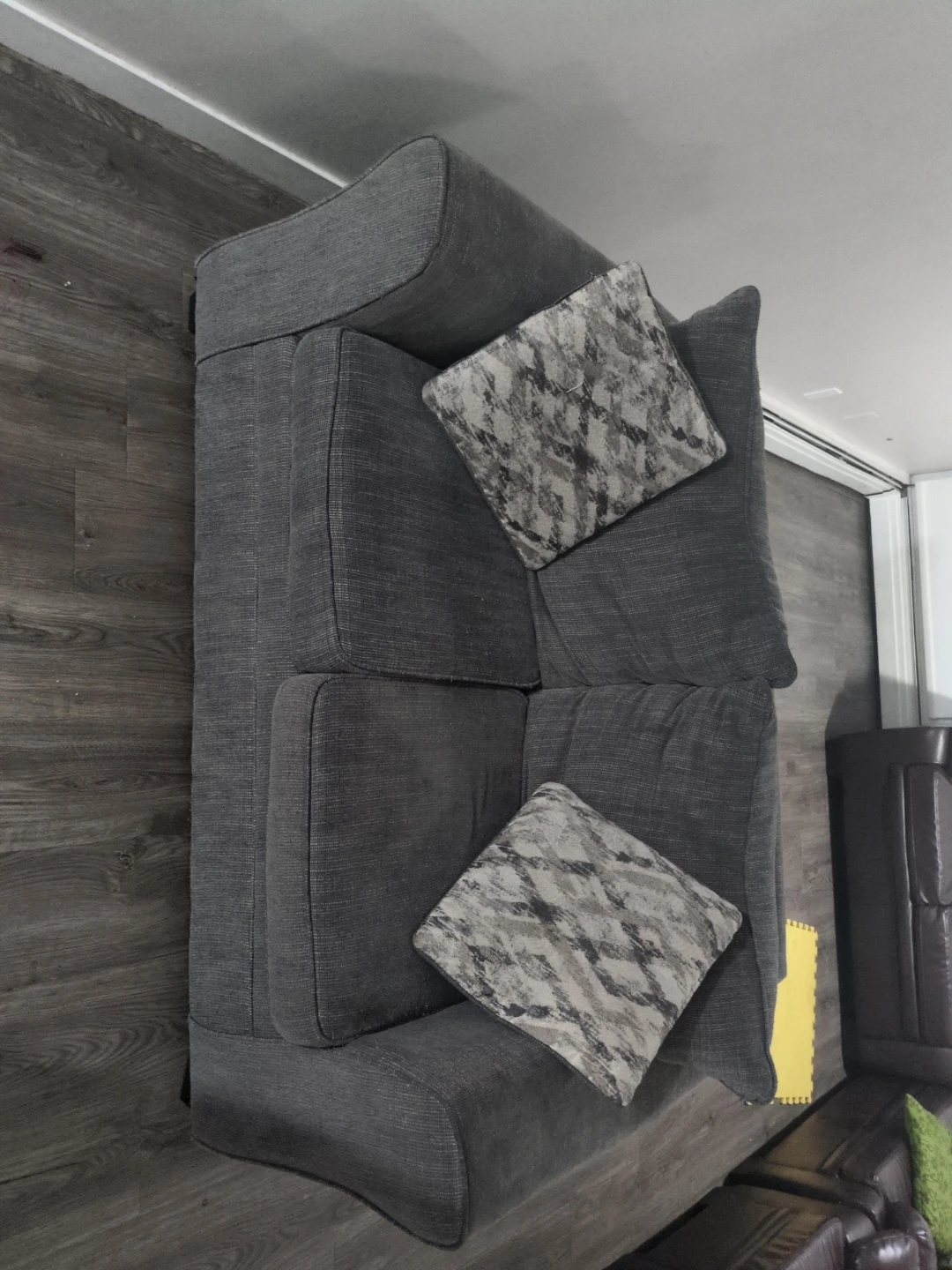 Grey fabric two-seater loveseat
