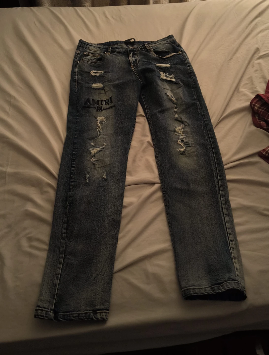 AMIRI Distressed Jeans