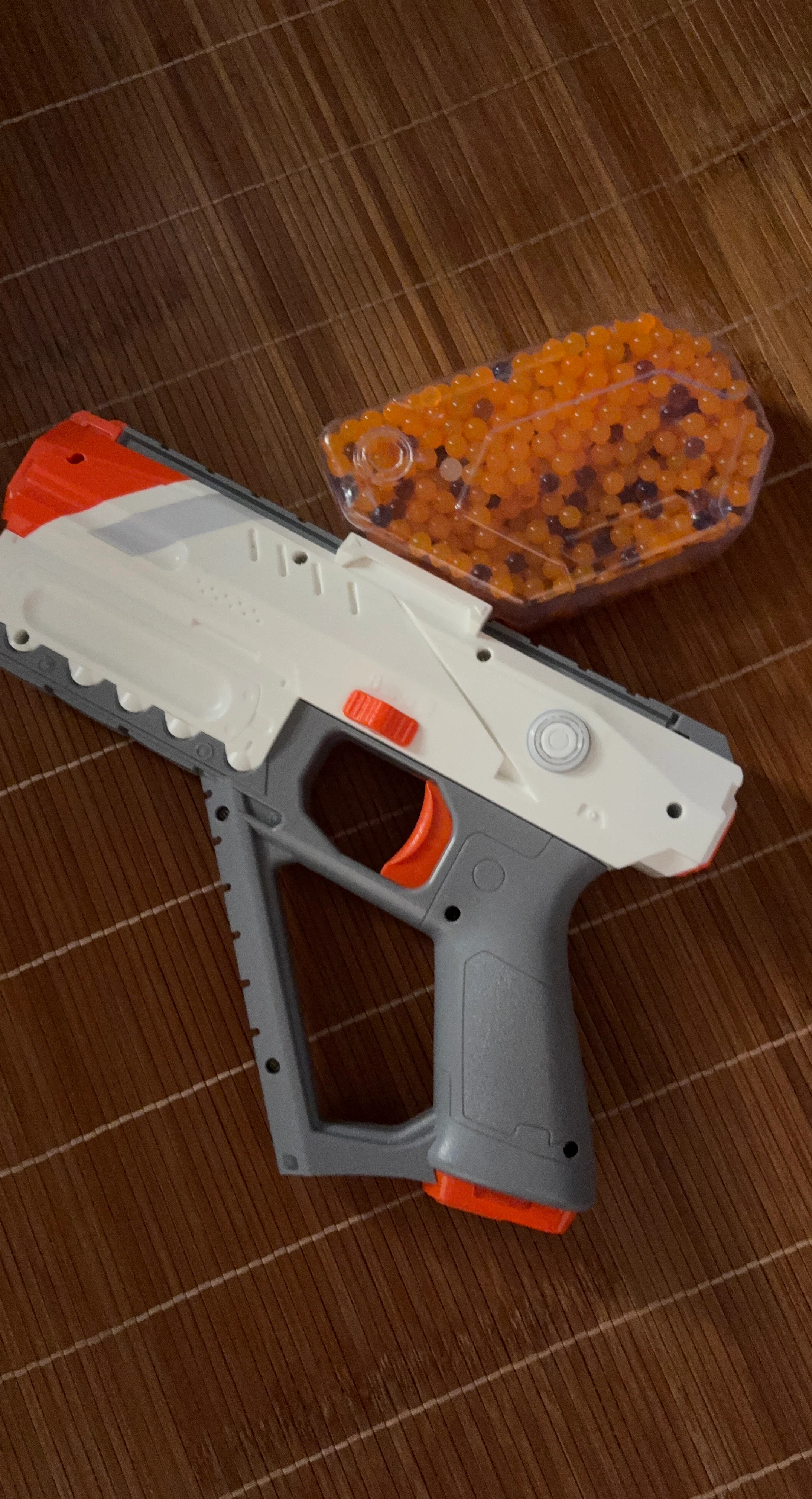 White and Orange Toy Gel Blaster with Gel Balls