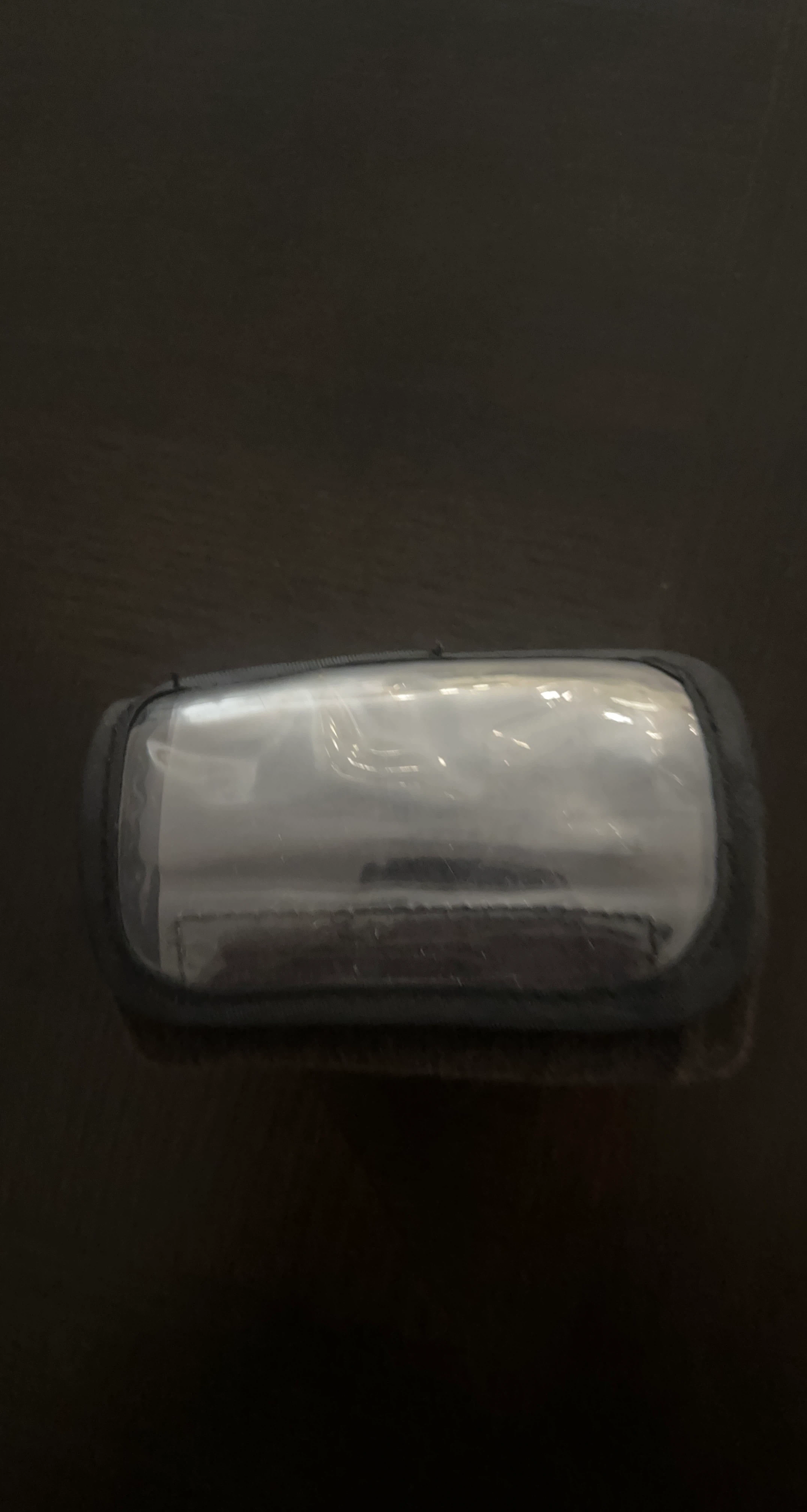 Small black zippered pouch with clear window