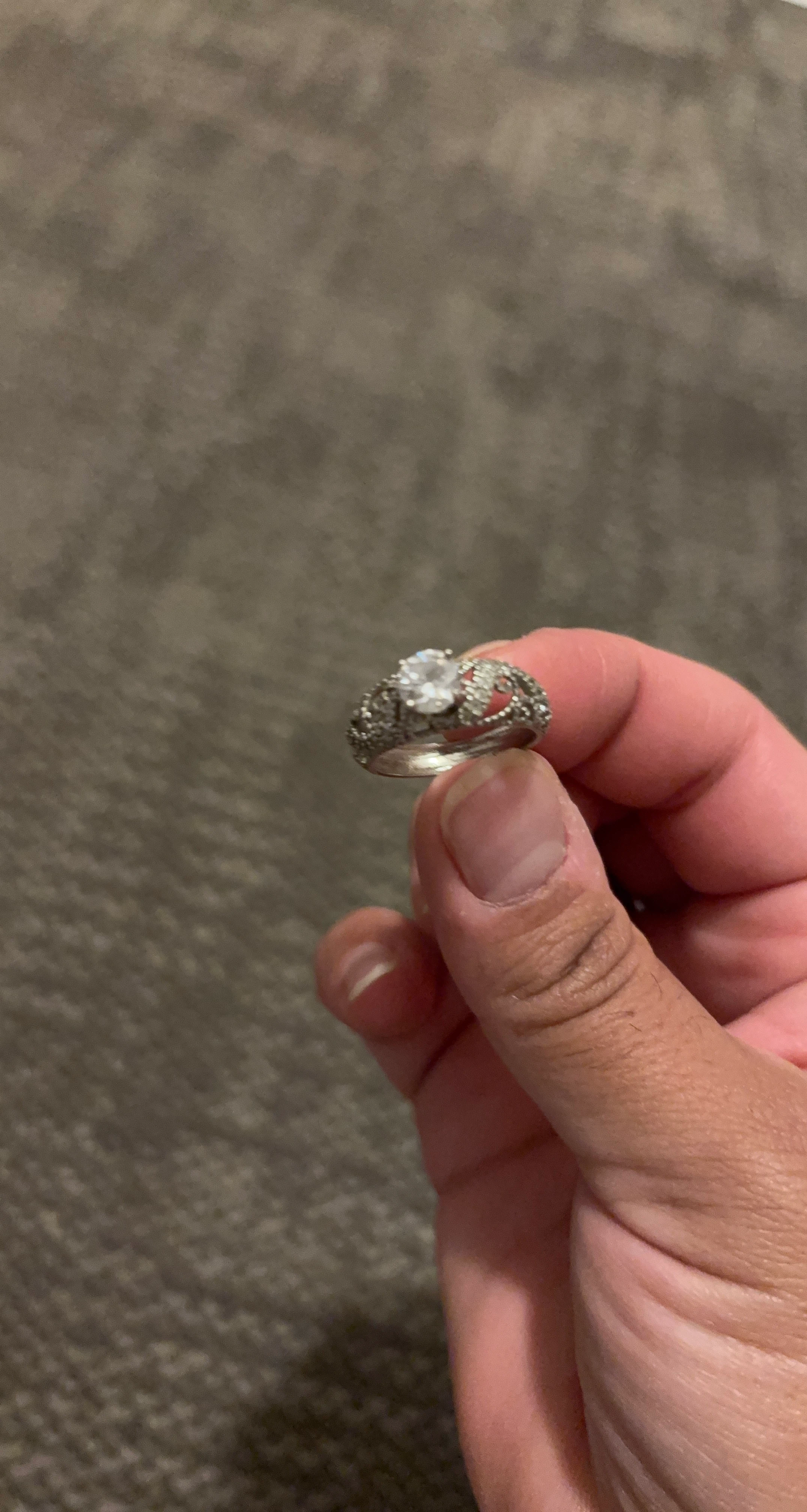 Silver-tone engagement ring with centre stone