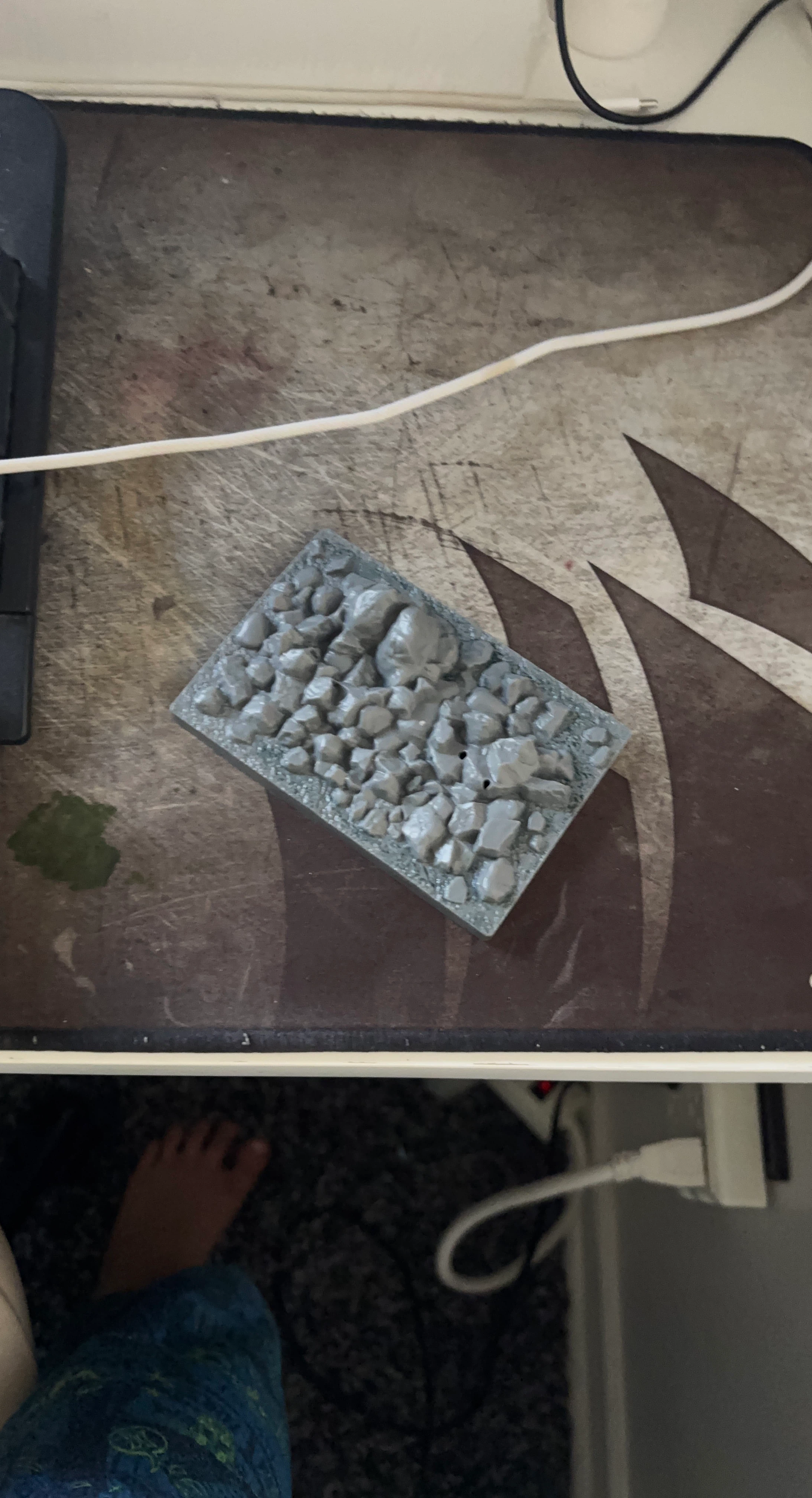 Grey rocky terrain miniature base