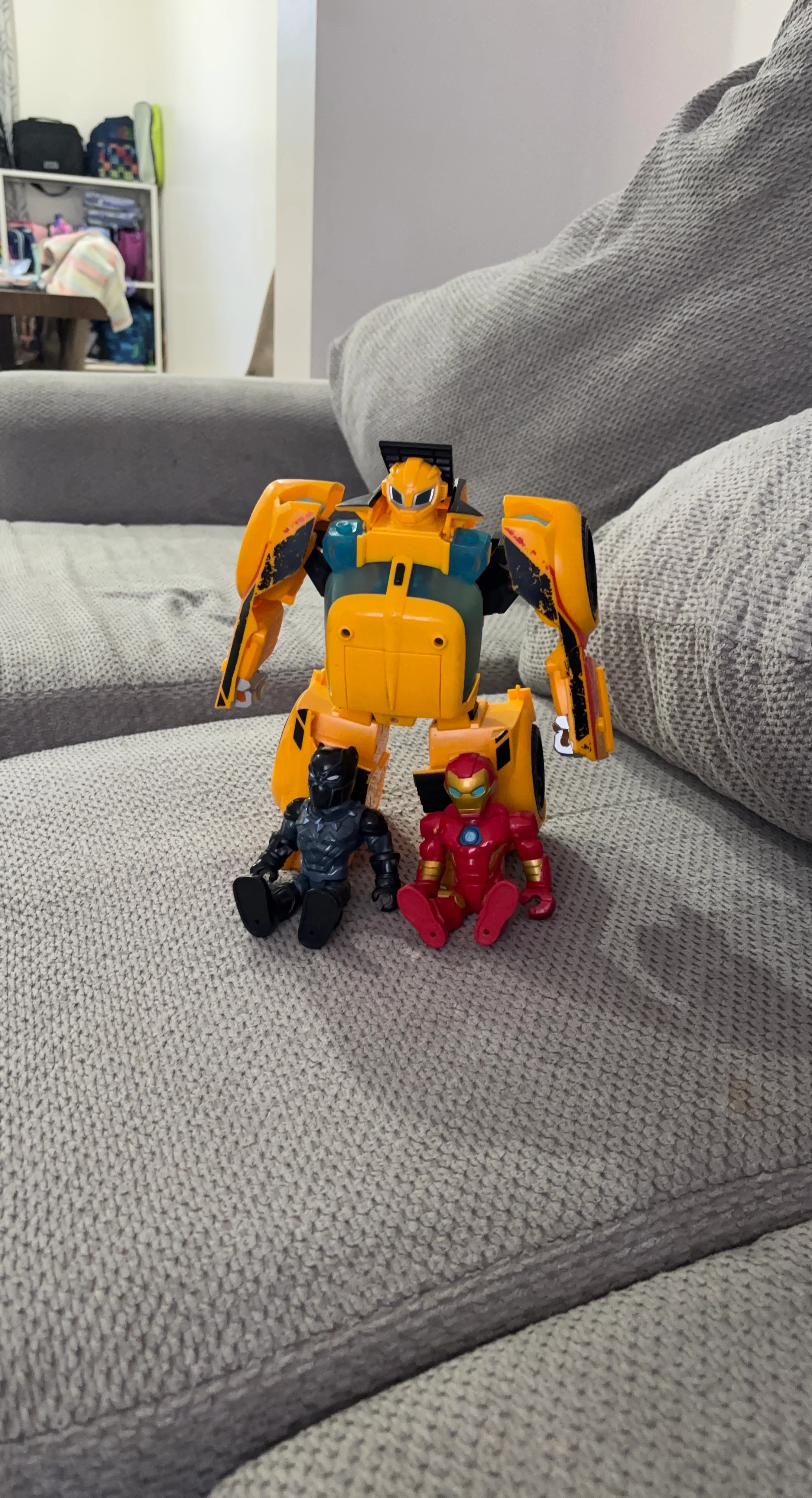 Transformer Toy with Black Panther and Iron Man Figures