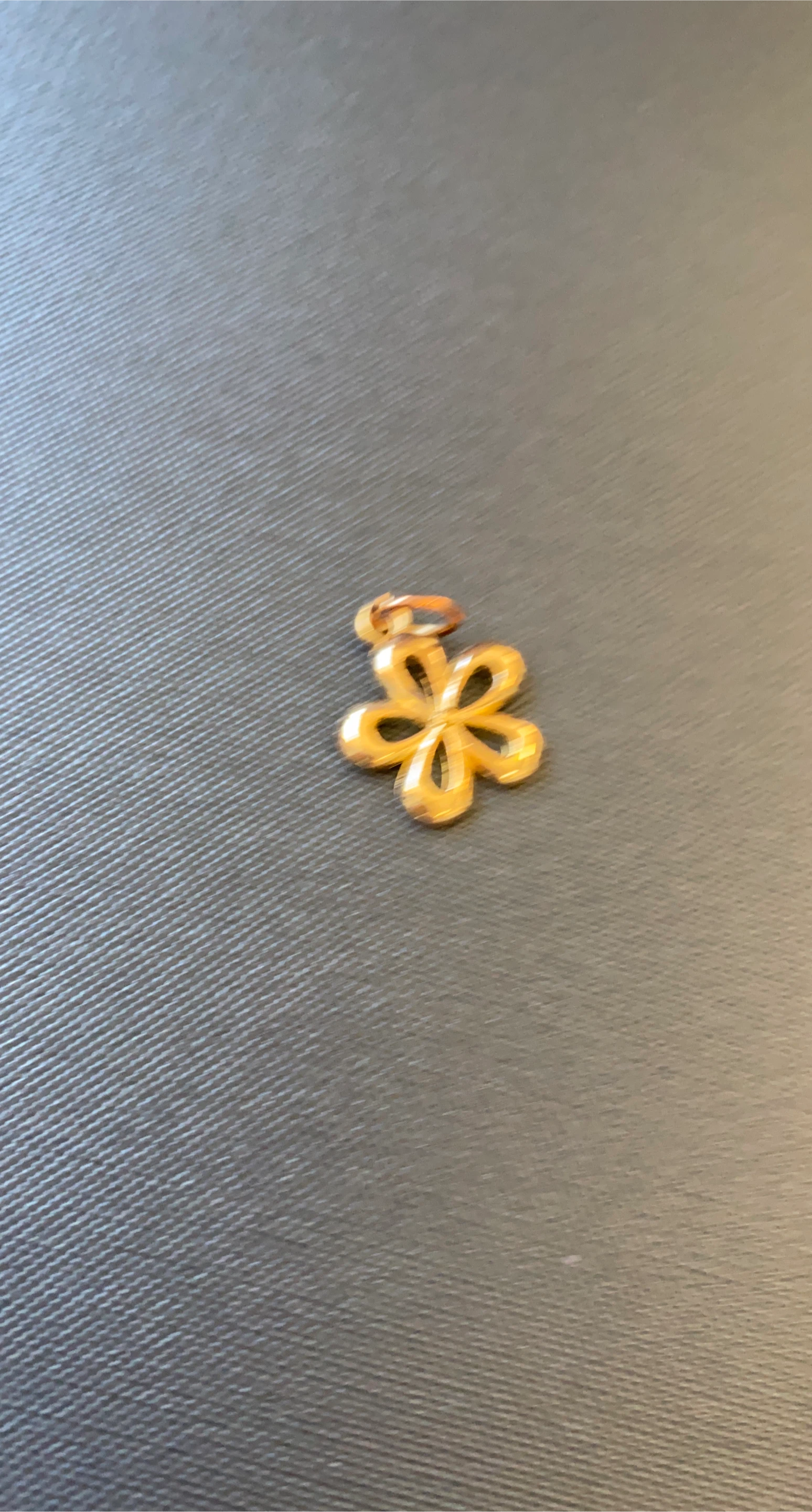 Gold flower pendant