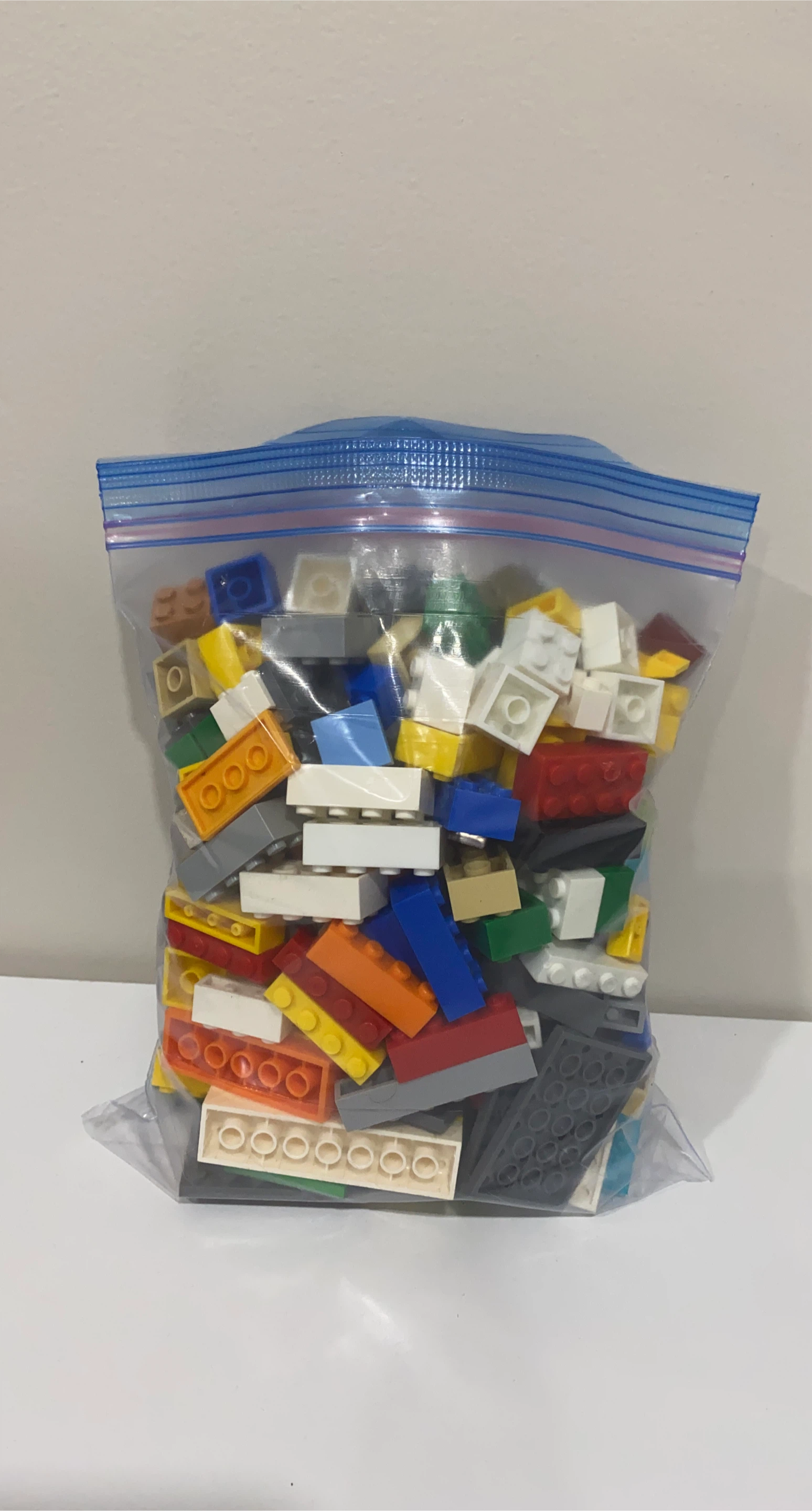 Bag of assorted LEGO building bricks