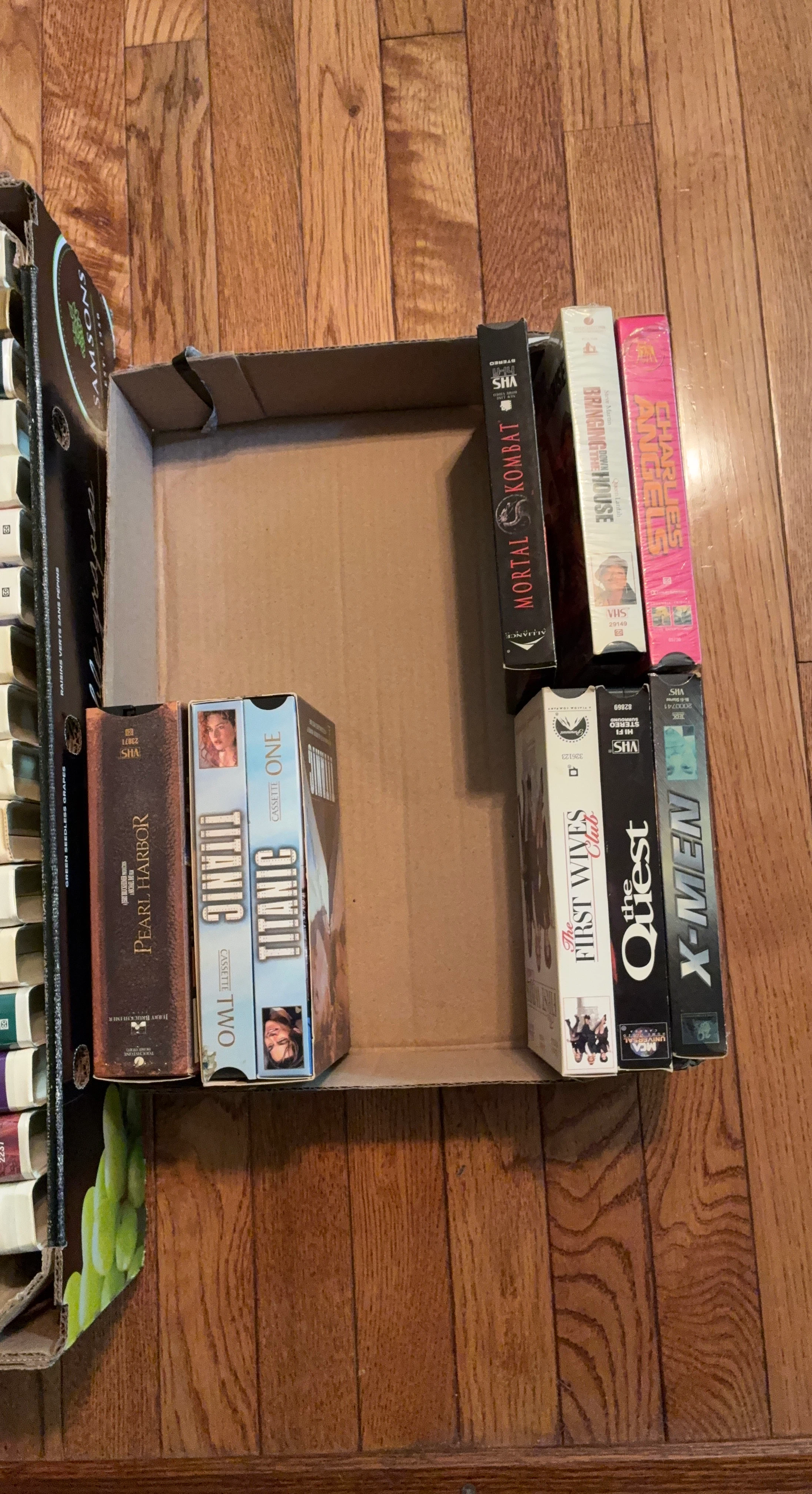 Collection of 8 VHS Movies plus box set