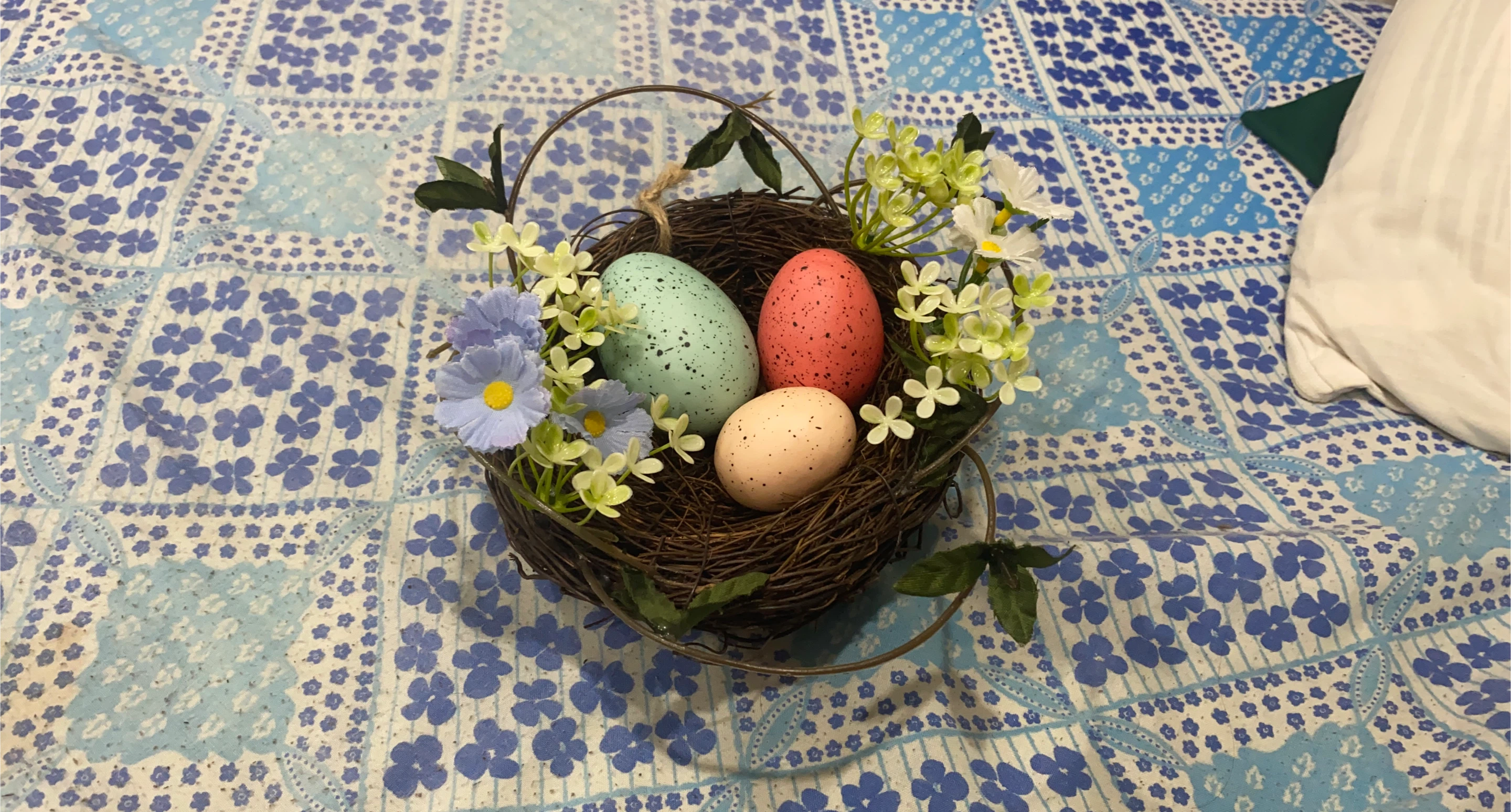 Easter Nest Decoration with Eggs and Flowers