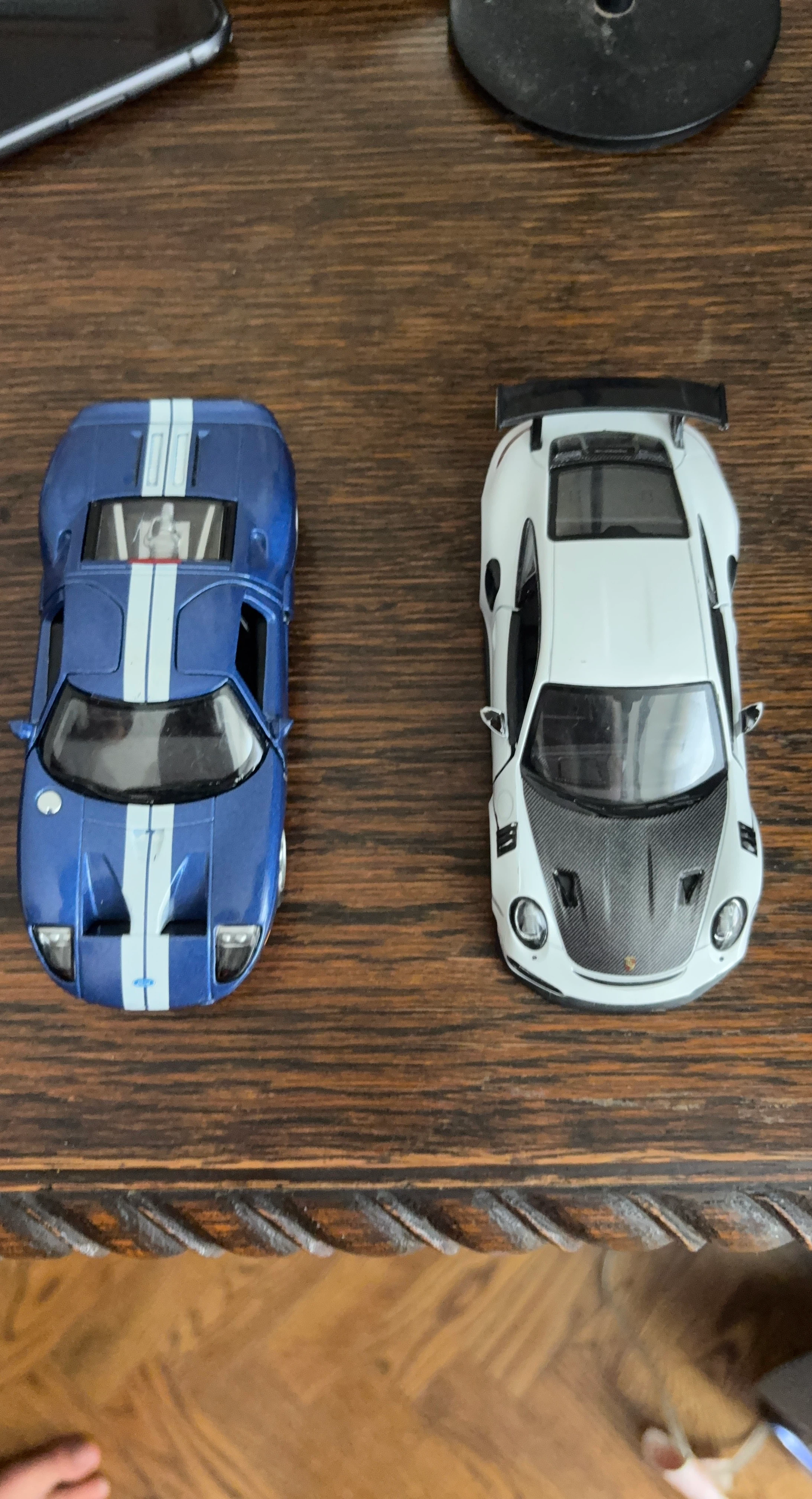 Blue Ford GT and White Porsche Toy Cars