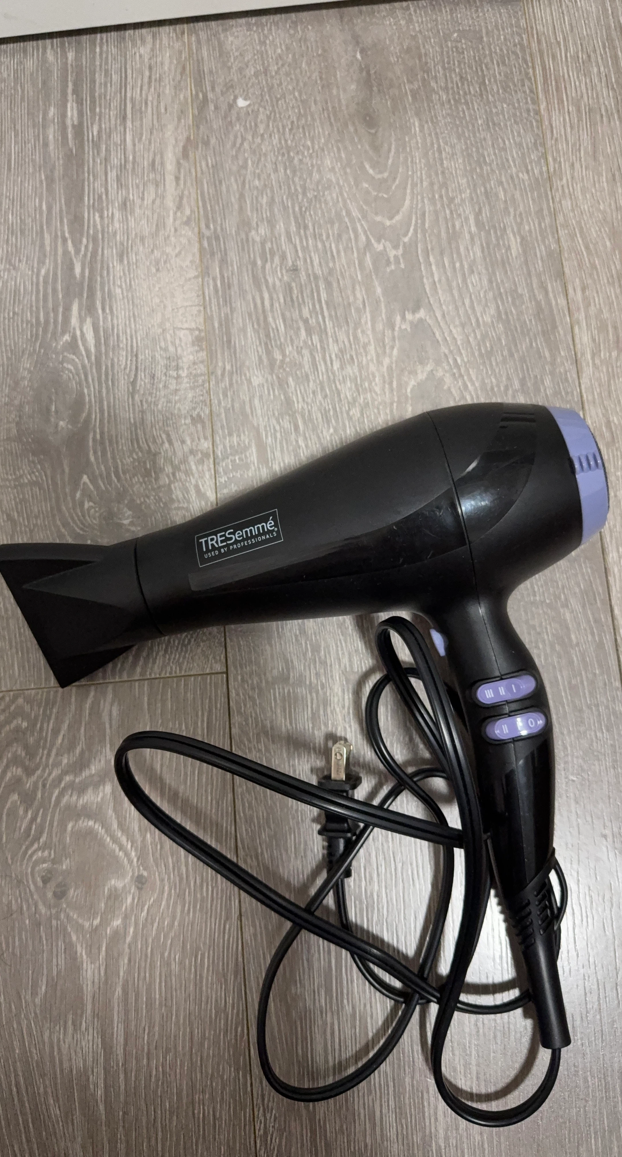 TRESemmé black hair dryer with purple accents