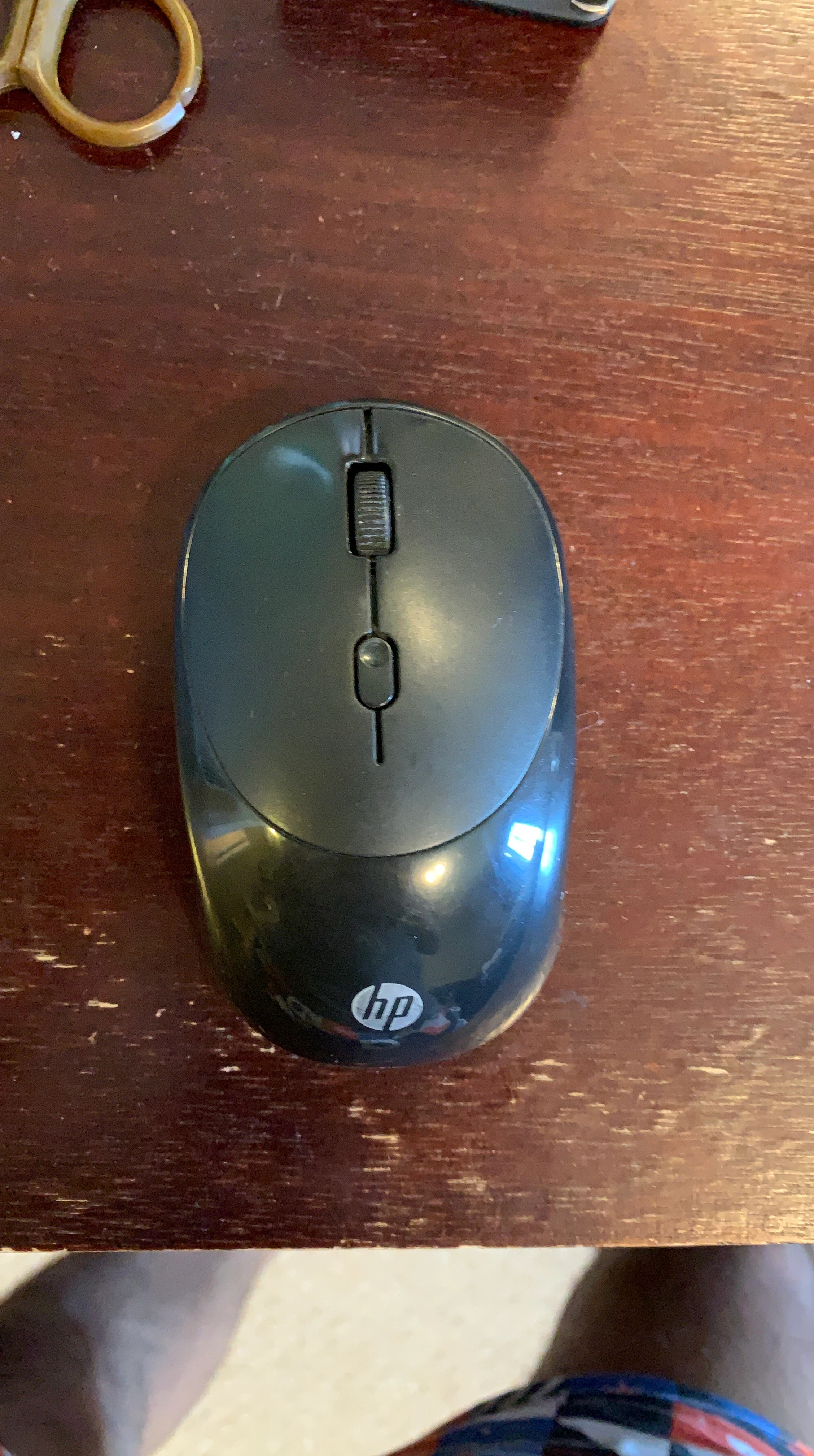 HP Wireless Mouse with its usb receiver