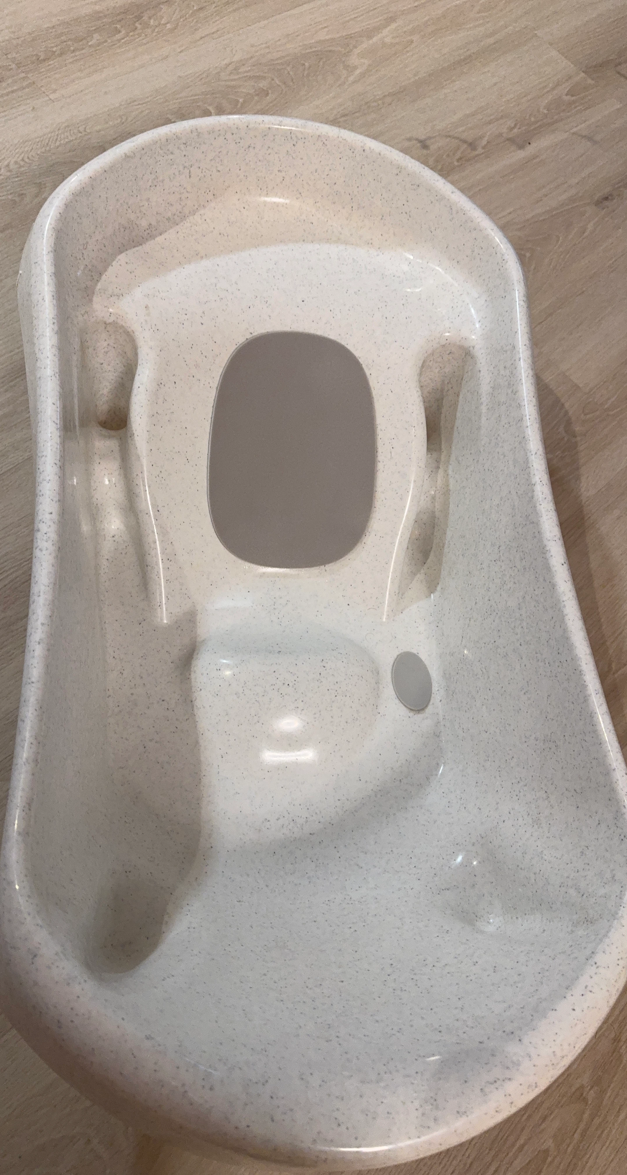 Mottled grey and white baby bathtub