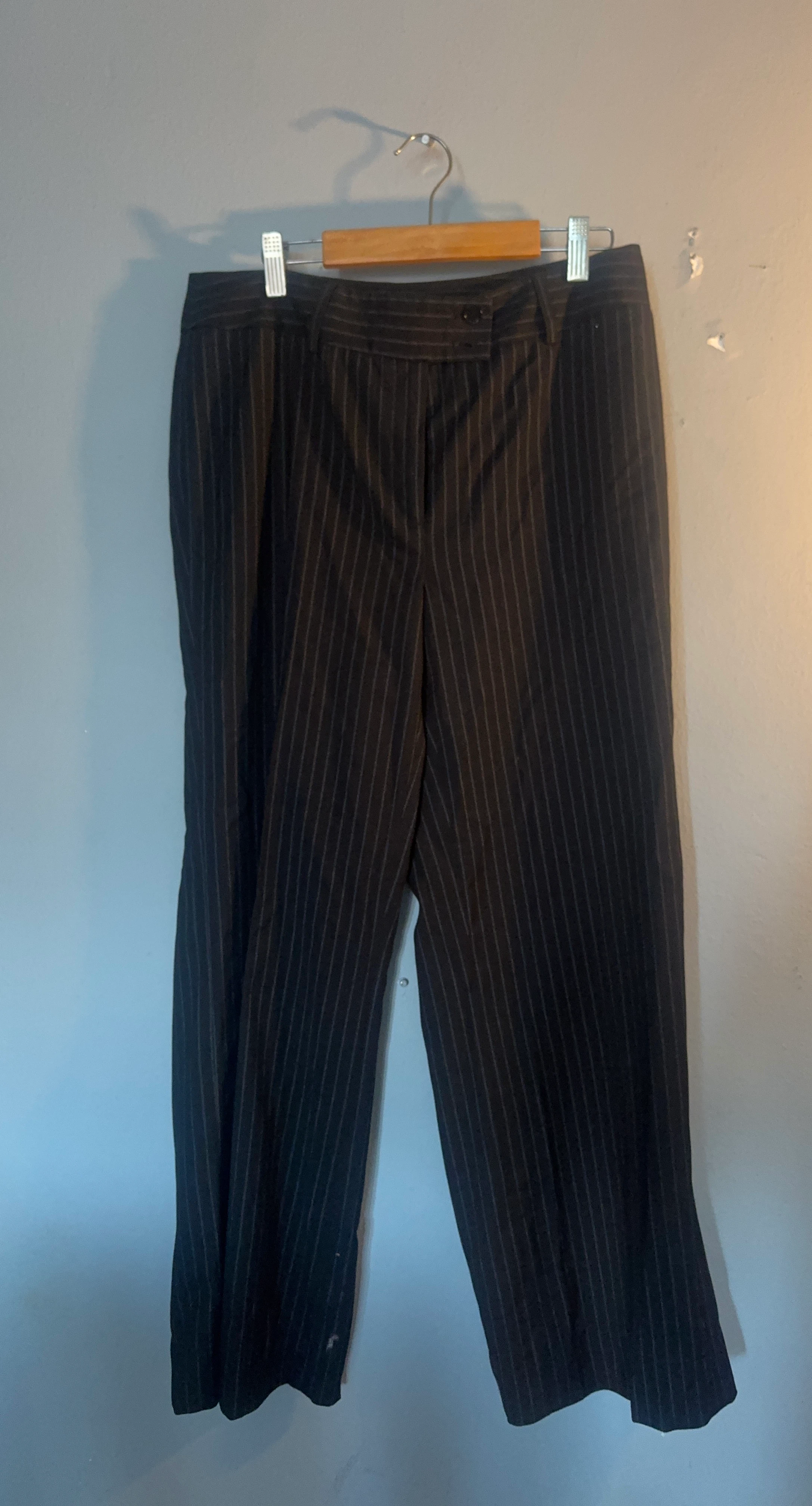Black pinstripe trousers