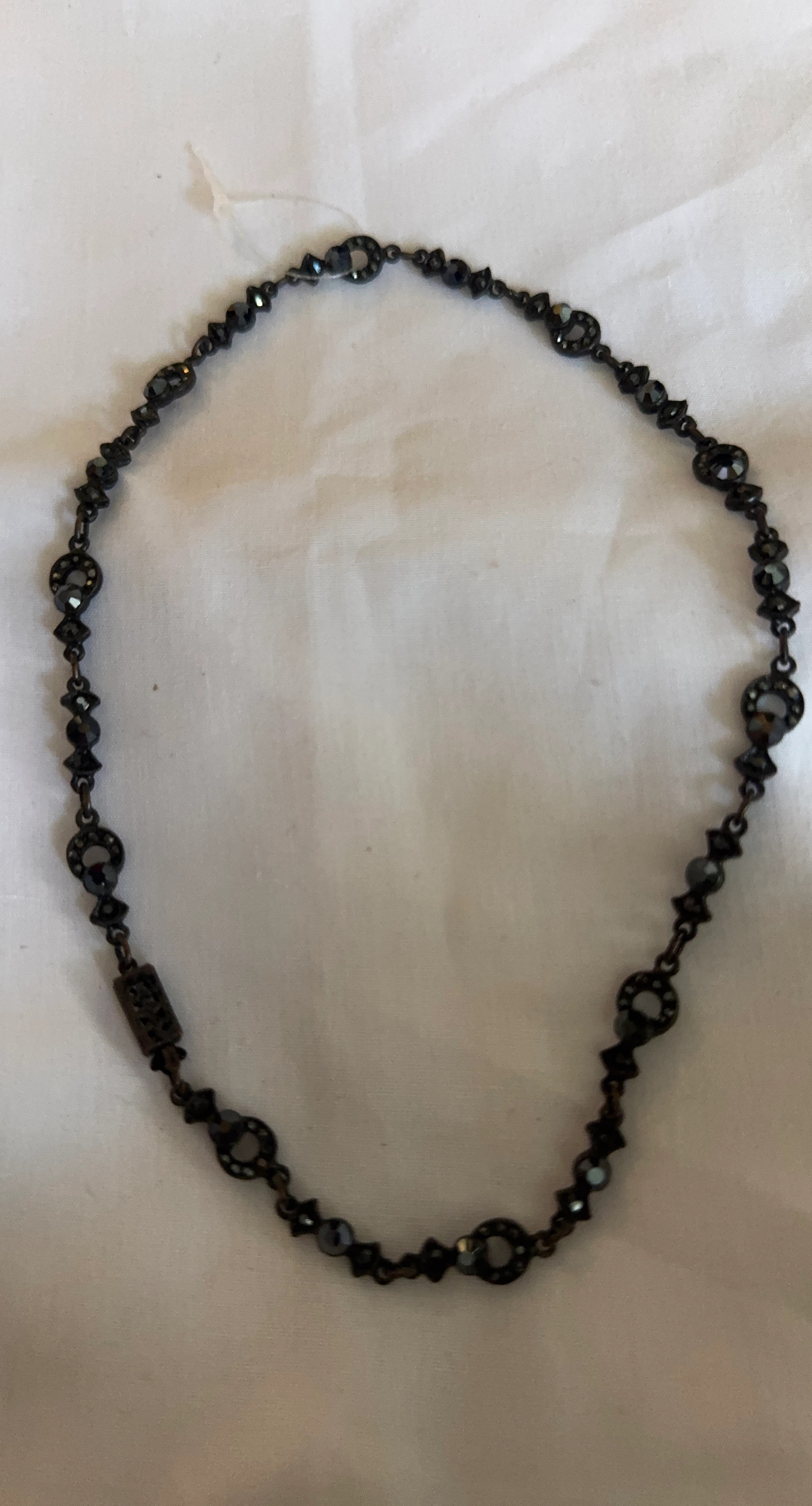 Black beaded necklace with ornate links