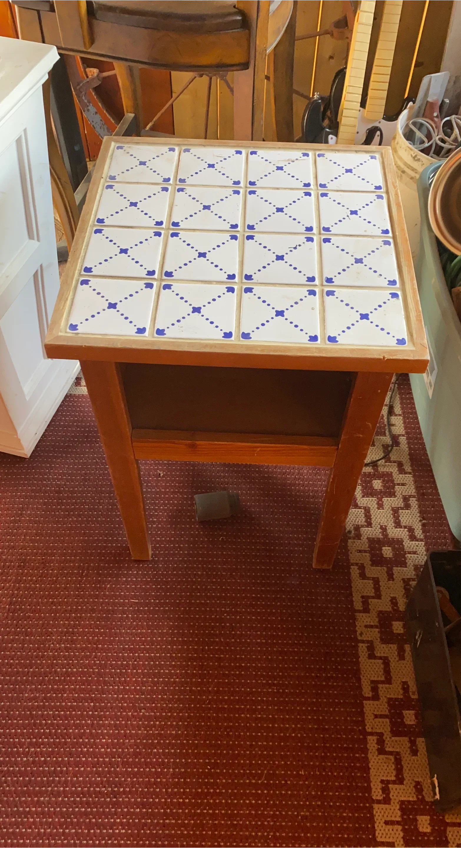 Wooden side table with tiled top