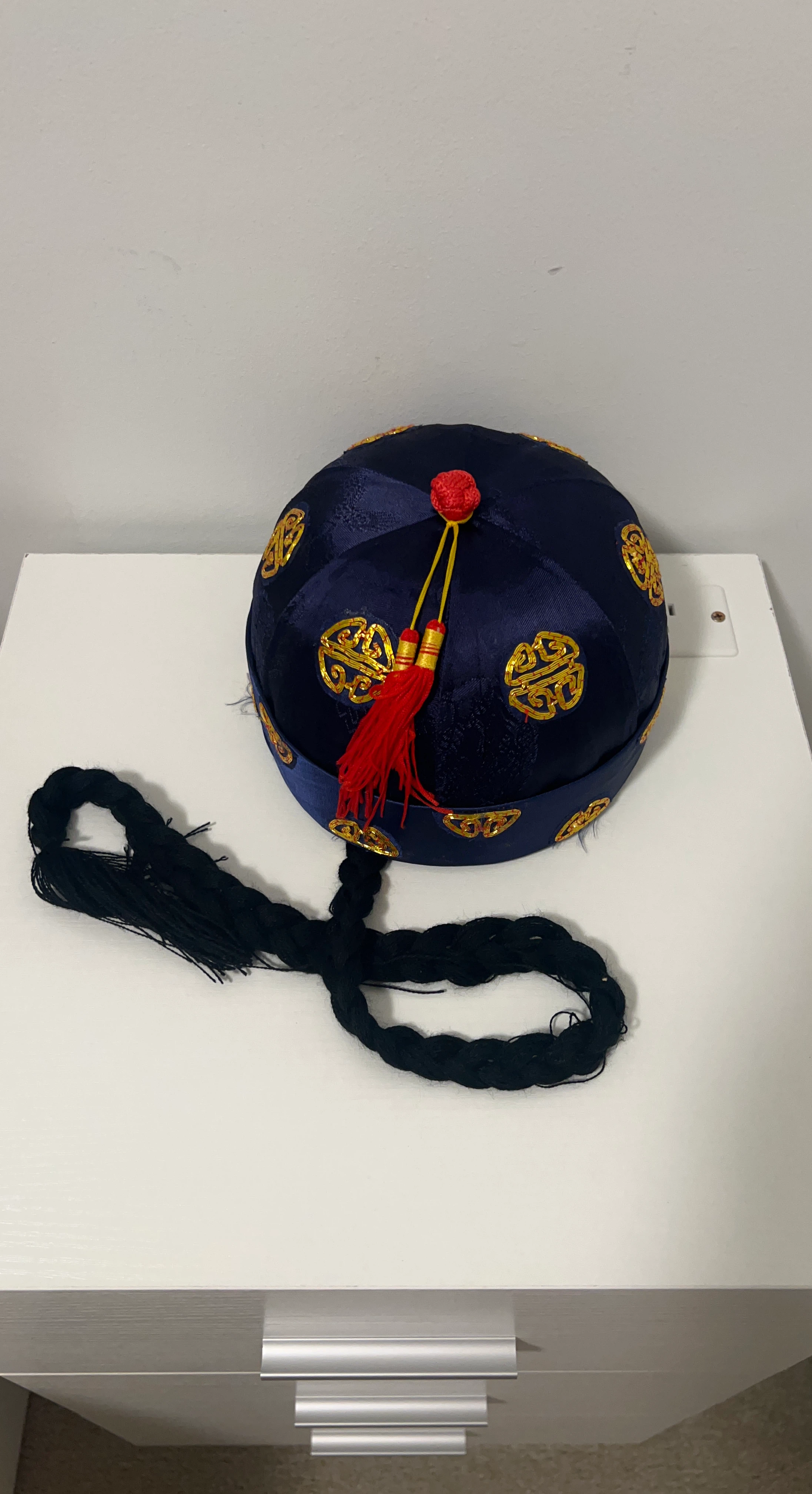 Dark Blue and Gold Traditional Hat with Red Tassel