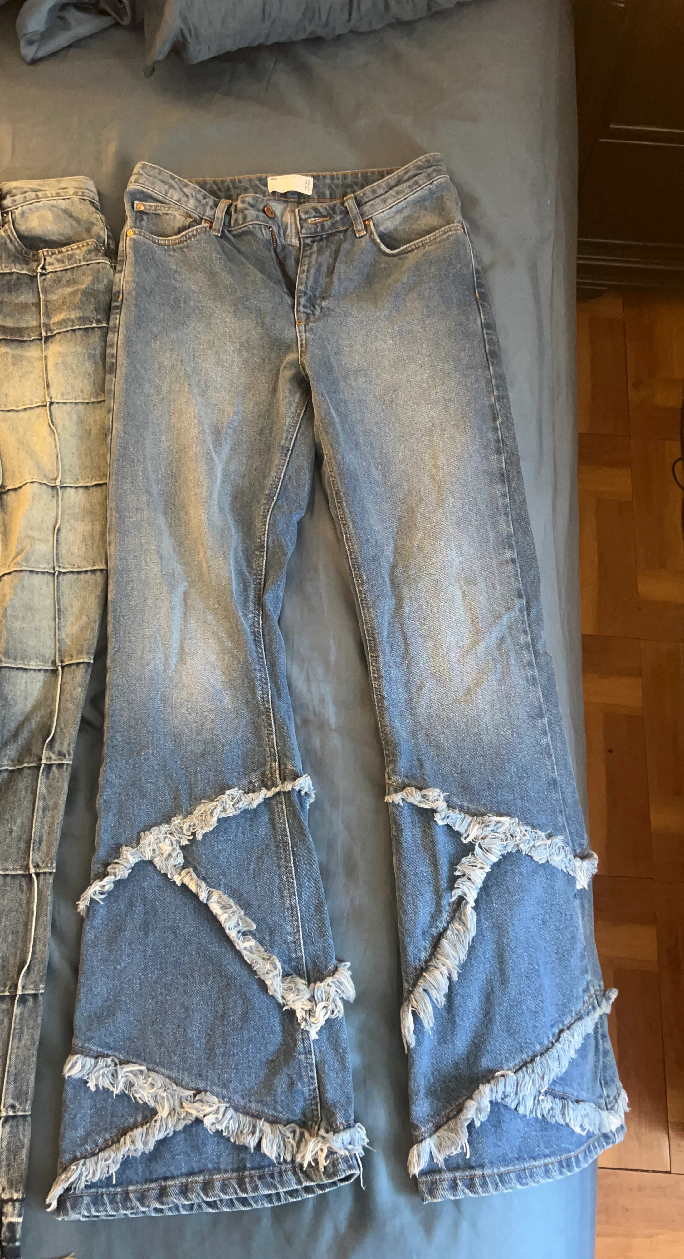 Blue Denim Jeans with Frayed Detailing