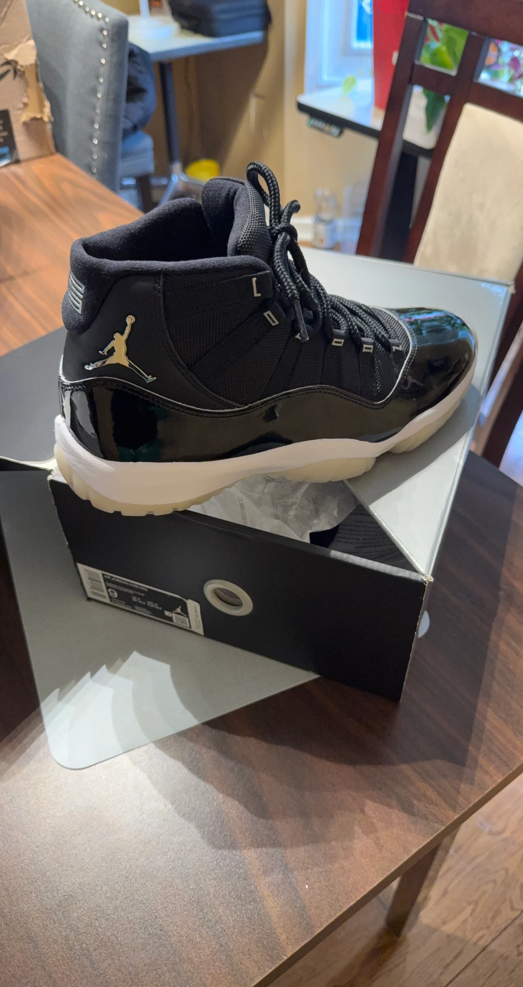 Air Jordan 11 Retro Black Patent Leather Sneakers
