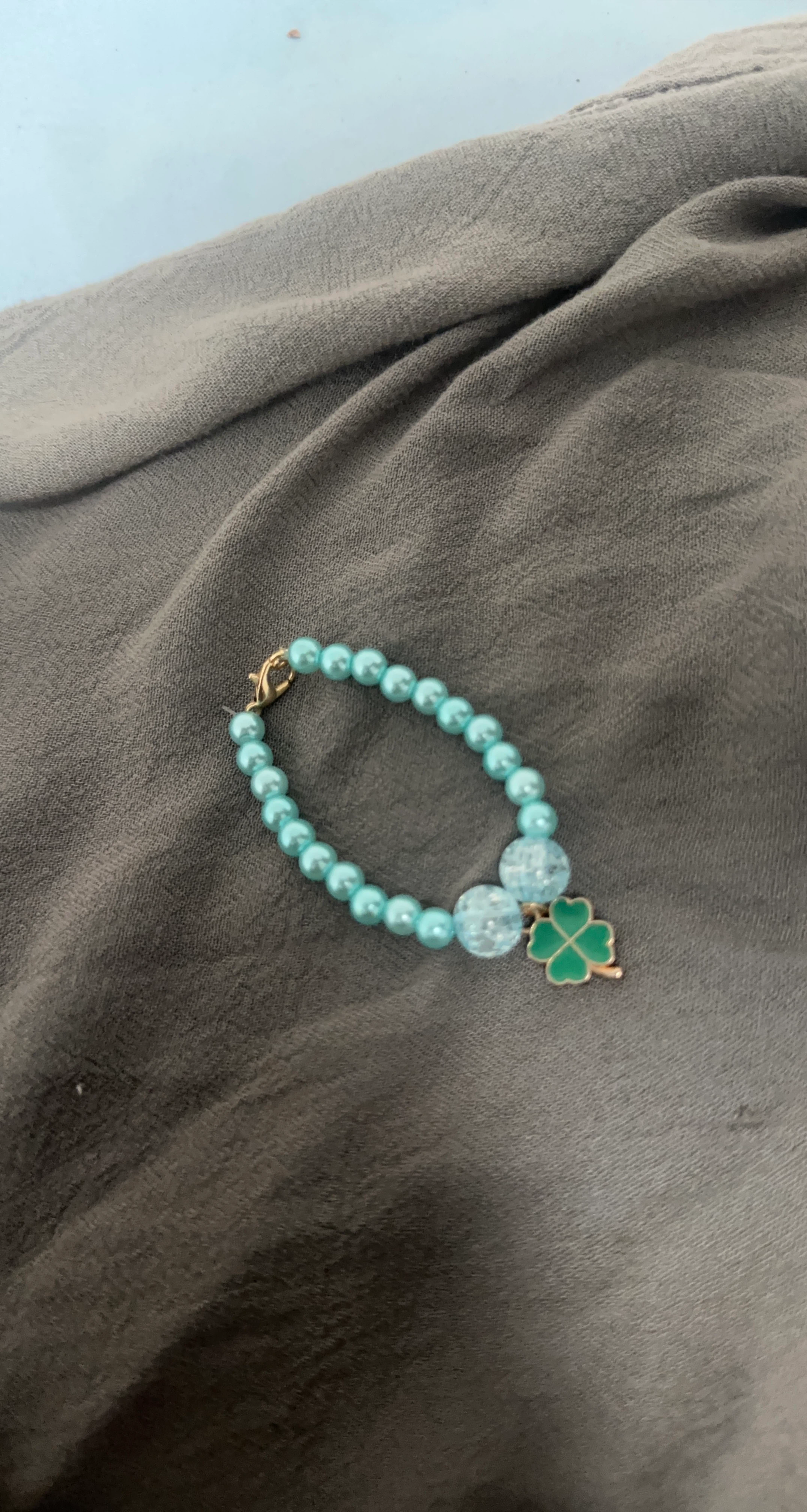 Blue Beaded Bracelet with Clover Charm
