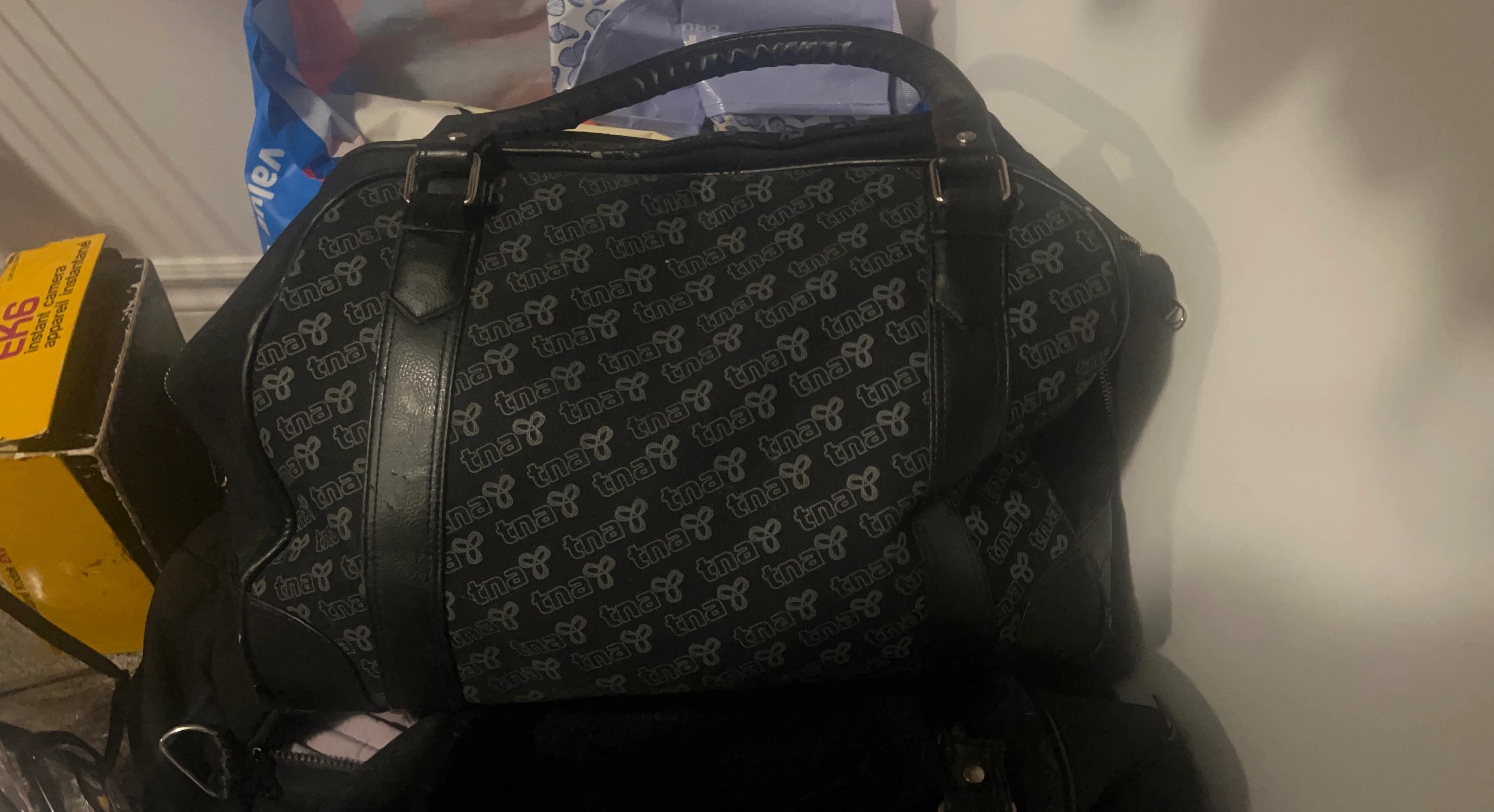 TNA Black Monogram Duffel Bag