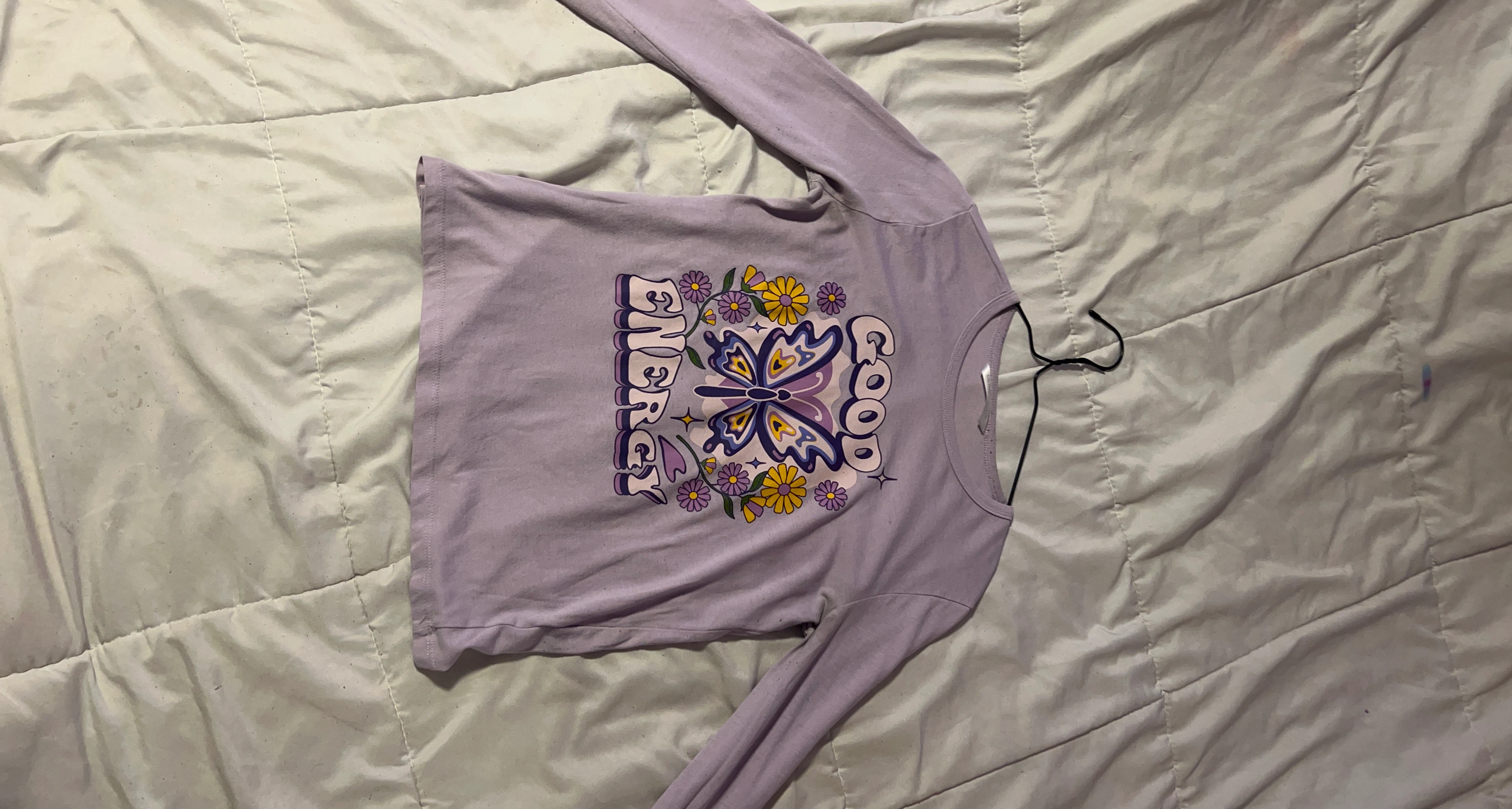 Purple long-sleeve t-shirt with butterfly graphic