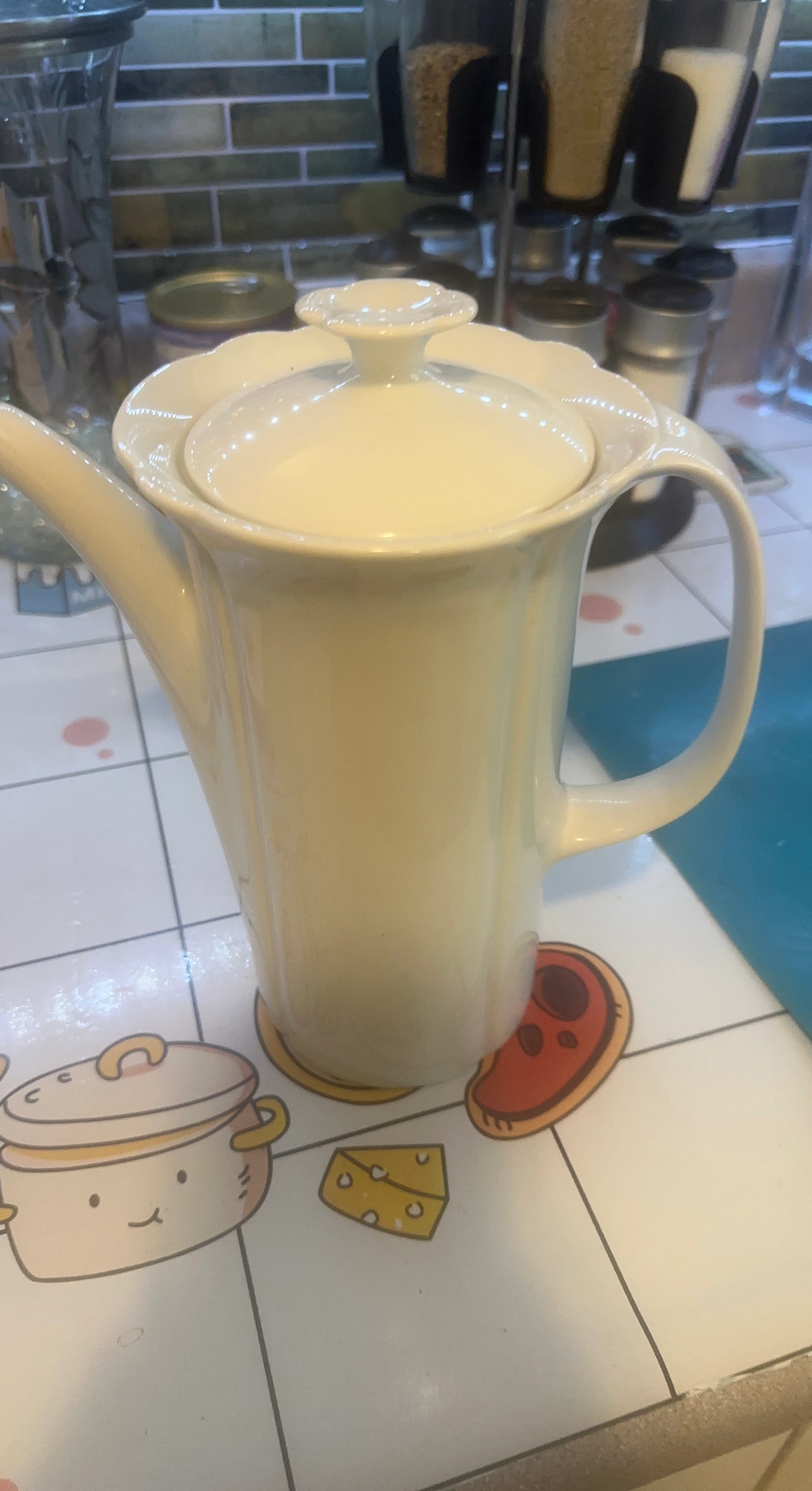 Creamy White Ceramic Teapot