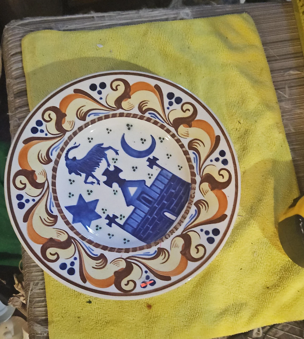 Decorative Plate with Goat and Castle Design