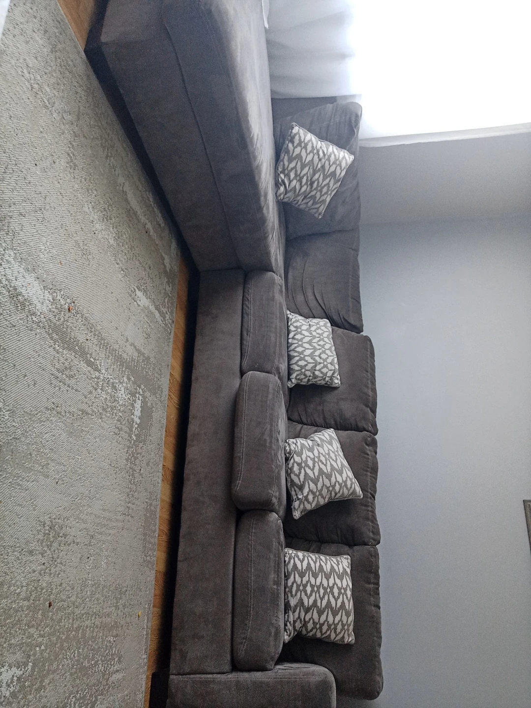 Grey Sectional Sofa with Pillows