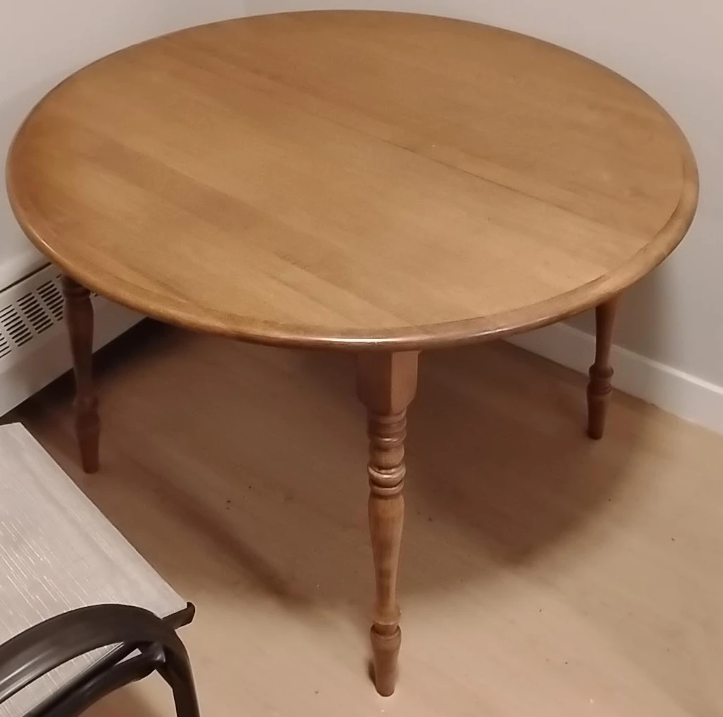 Round wooden dining table