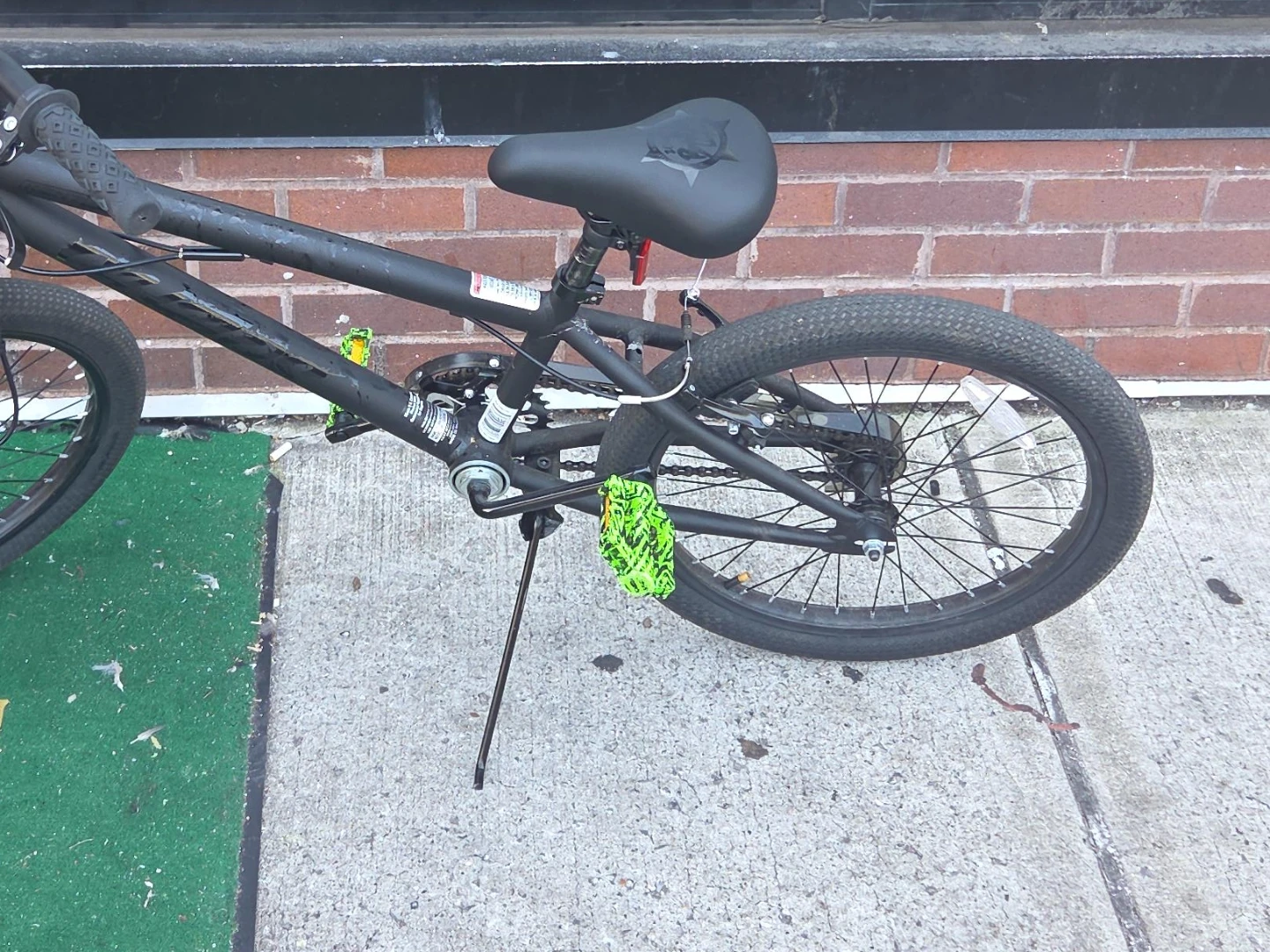 Black BMX Bike with Green Accents