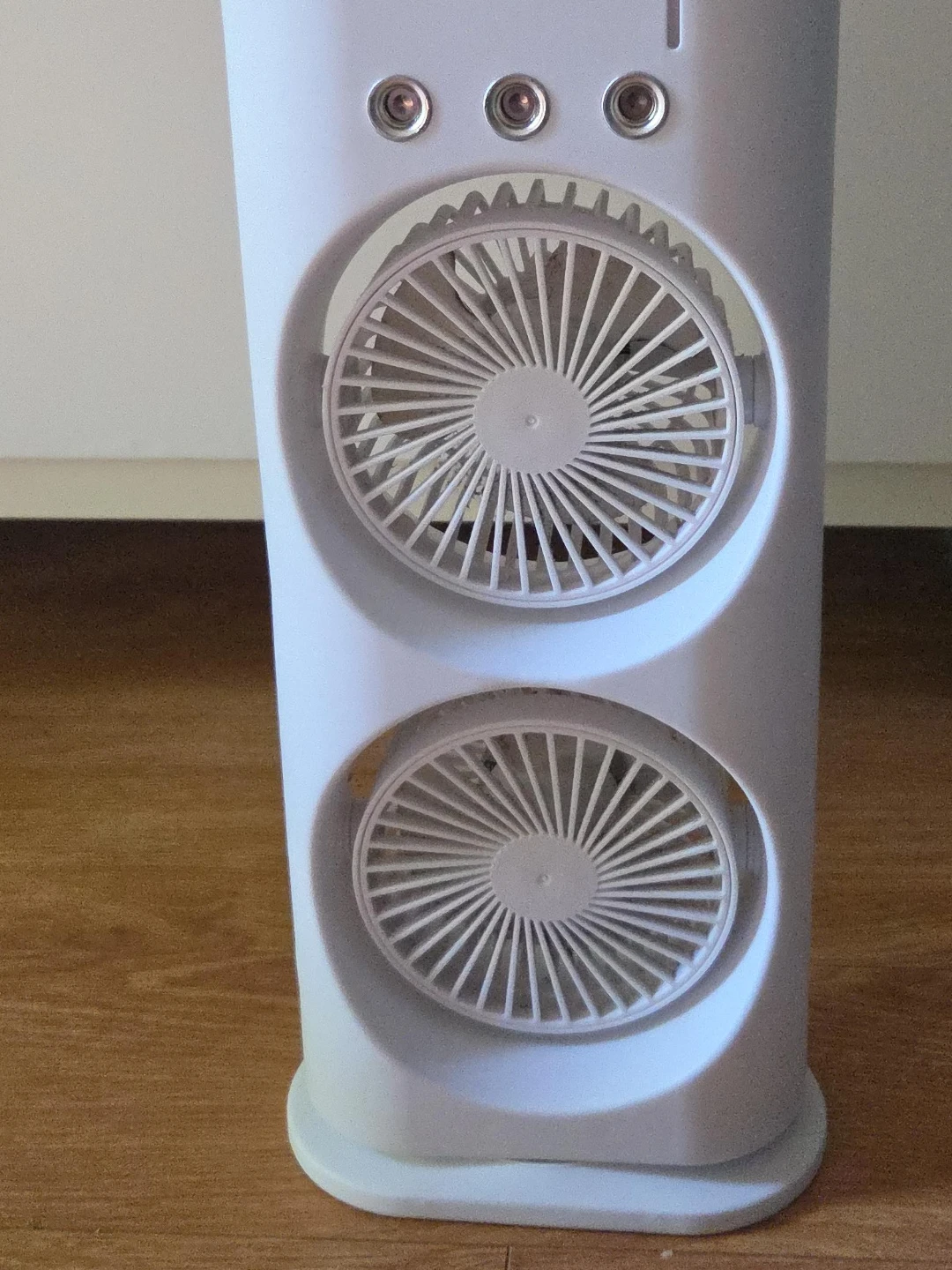 Portible White Tower Dyal Fans with water for cooling.