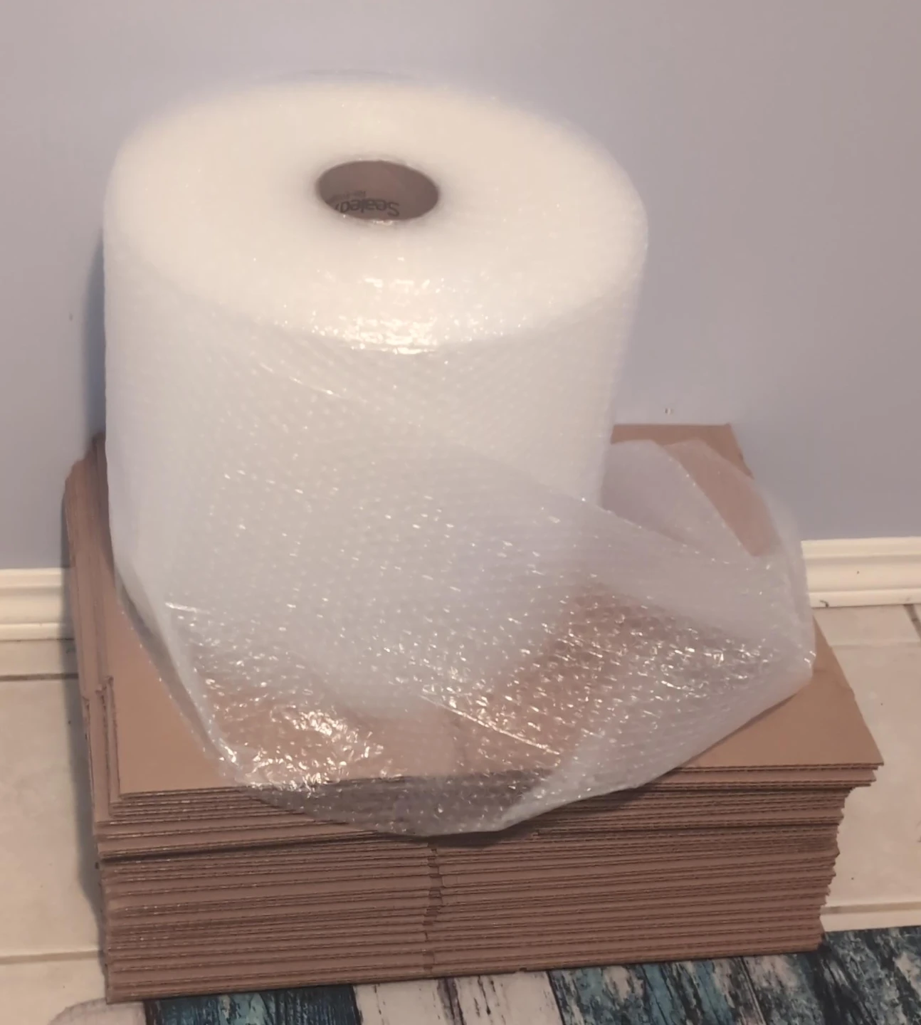 Sealed Air Bubble Wrap Roll and Cardboard Boxes